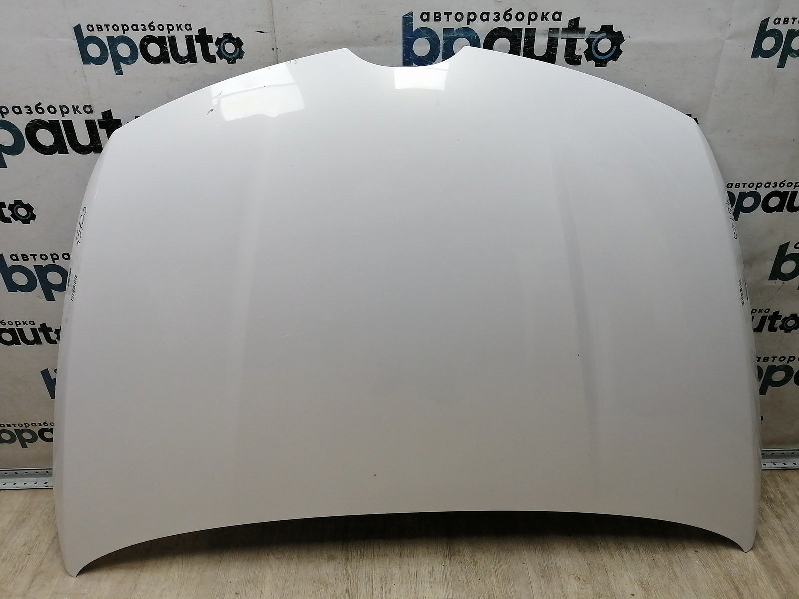 Пример детали Капот (EGY15231XD); Mazda CX-7 I (2006-2009), I рест. (2009-2012) /AA045237/ БУ; Оригинал; Р1, Мелкий дефект; 