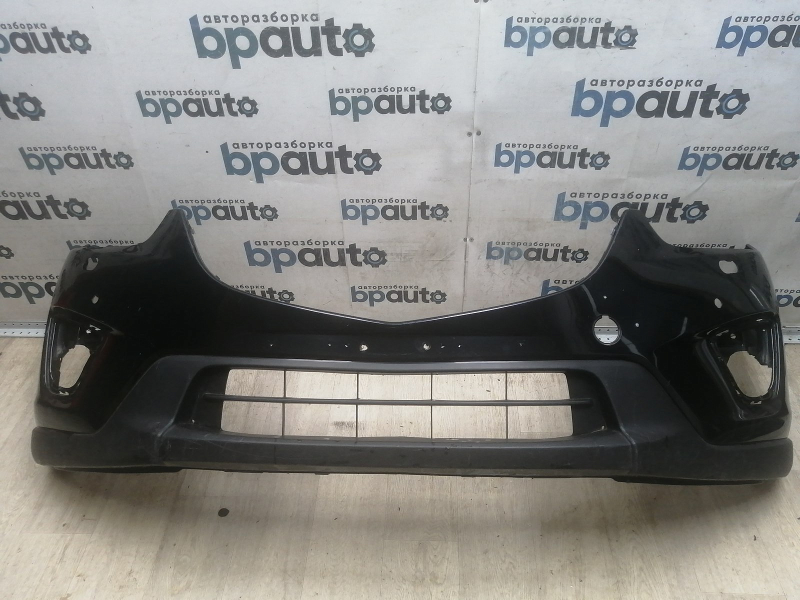 Пример детали Бампер передний; под паркт.; под омыват. (KD45-50031); Mazda CX-5 I (2011-2015), I рест. (2015-2017) /AA045752/ БУ; Оригинал; Р1, Мелкий дефект; 