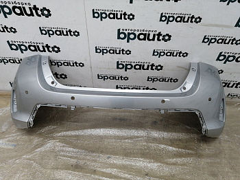 Пример детали Бампер задний; под паркт. (52159-02840); Toyota Auris II (2013 — 2015) /AA011373/ БУ; Оригинал; Р0, Хорошее; (1F7) Серебро металик