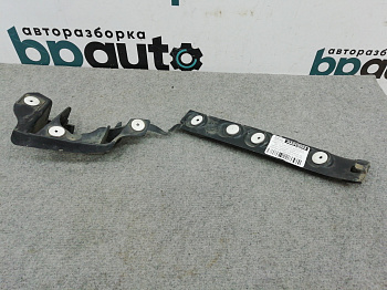 Фотография детали AA010033; Кронштейн заднего бампера левый (13266739) для Opel Astra J HB 5D (2010 - 2012)/БУ; Оригинал; Р1, Мелкий дефект; . Фото номер 1
