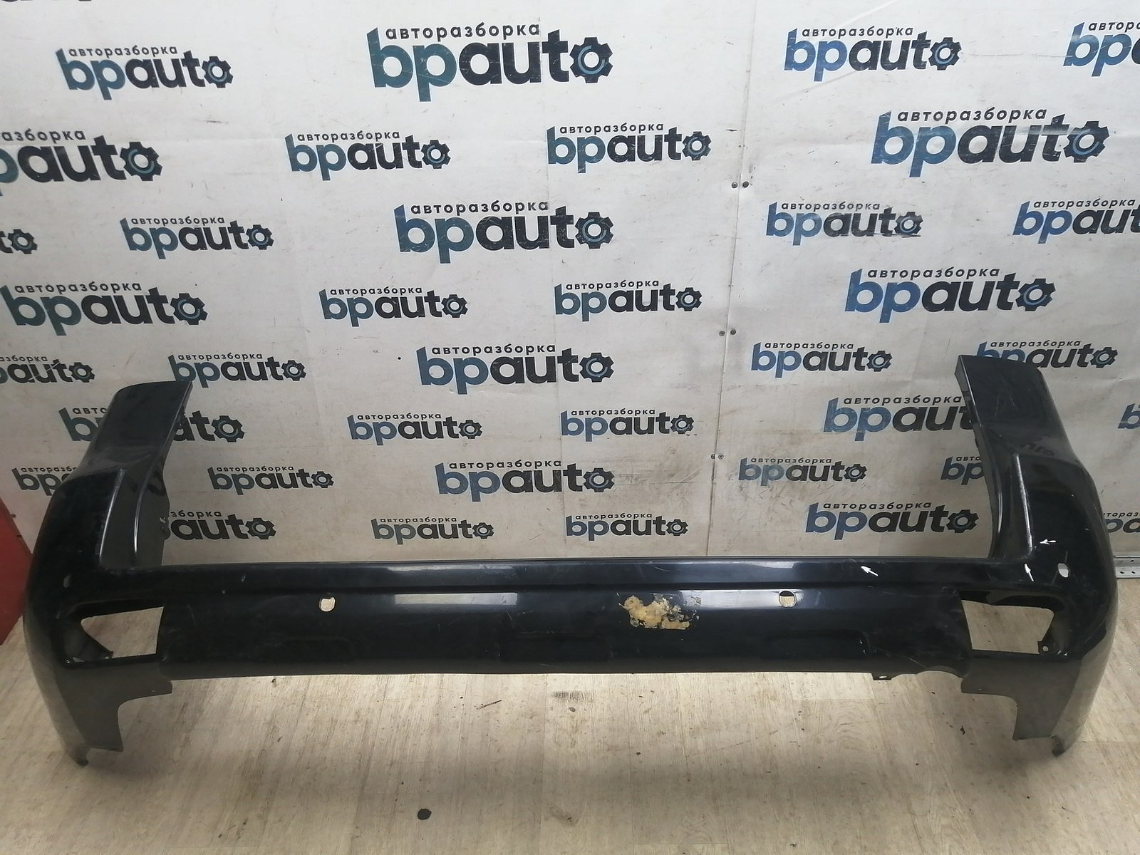 Пример детали Бампер задний; под паркт. (52159-60500); Toyota Land Cruiser Prado 150 (2010 — 2013), 150 рест. (2013 — 2017) /AA045785/ БУ; Оригинал; Р1, Мелкий дефект; 
