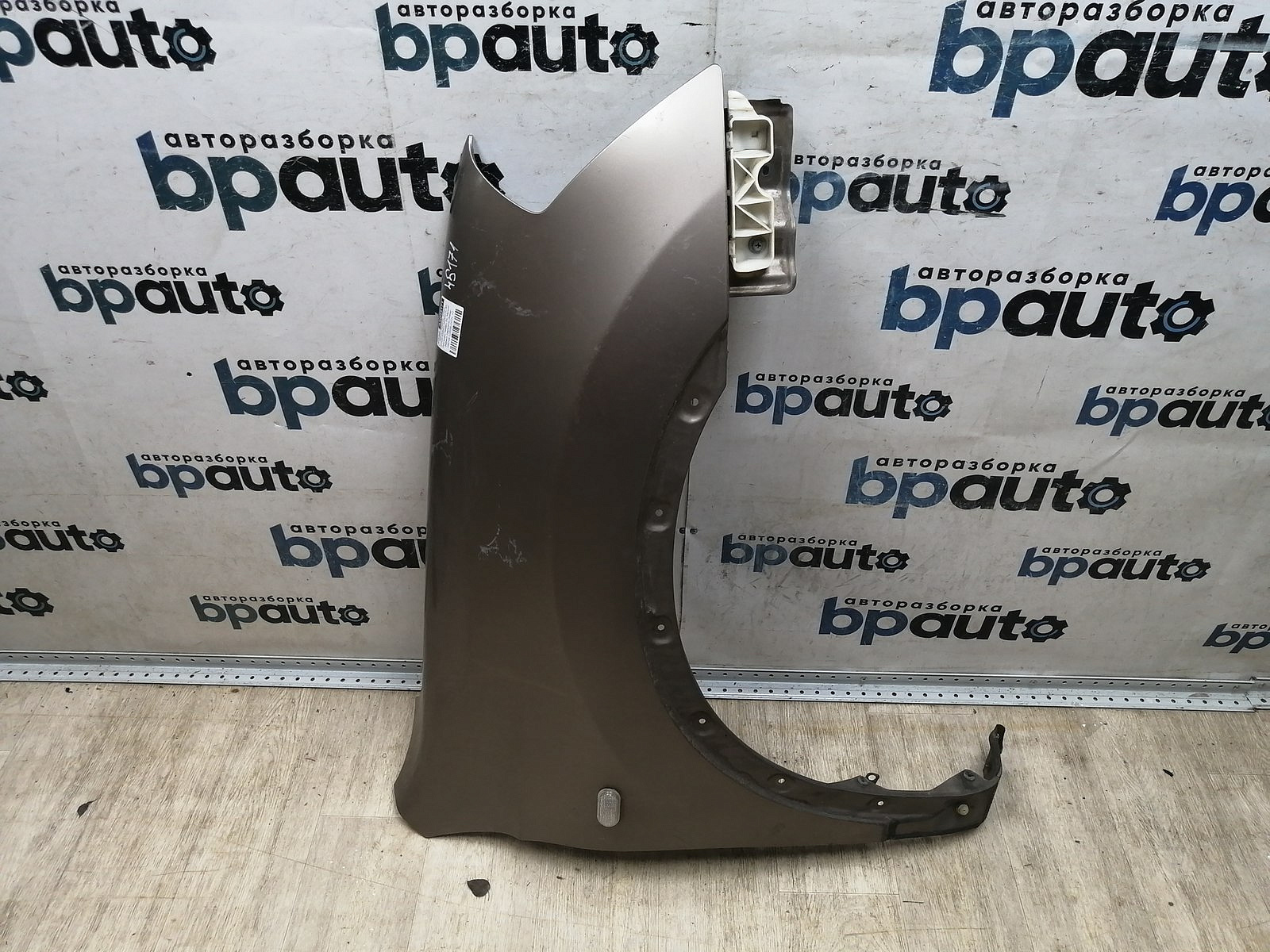Пример детали Крыло переднее правое (F3100-JD0M0); Nissan Qashqai I (2006-2010), +2 (2008-2010) /AA045171/ БУ; Оригинал; Р1, Мелкий дефект; 