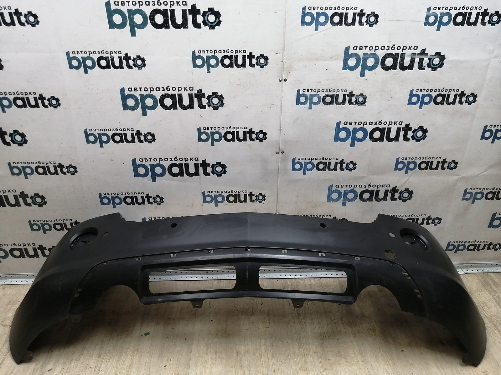 Пример детали Бампер задний; под паркт. (96660231); Opel Antara (2007 - 2011), рест. (2012 - 2015) /AA045069/ БУ; Оригинал; Р1, Мелкий дефект;