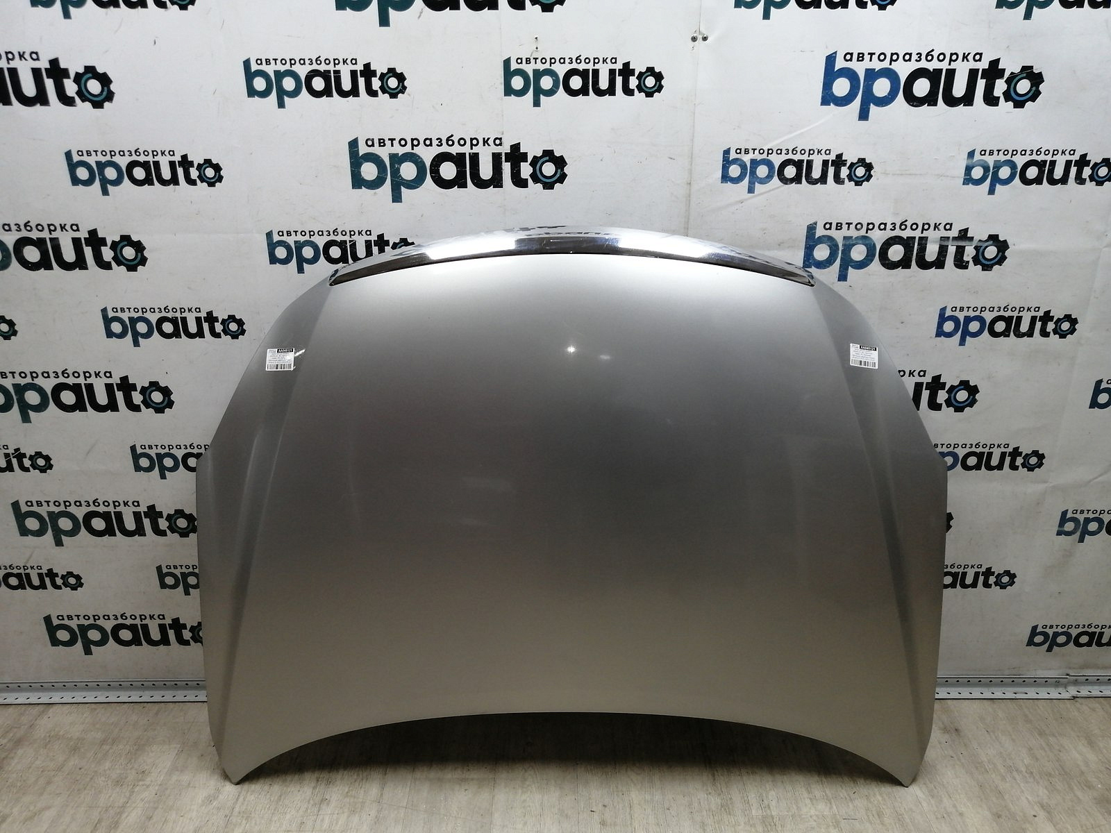 Пример детали Капот (65100-4AA8A); Nissan Almera III (G15) (2012-2018) /AA045121/ БУ; Оригинал; Р0, Хорошее; 