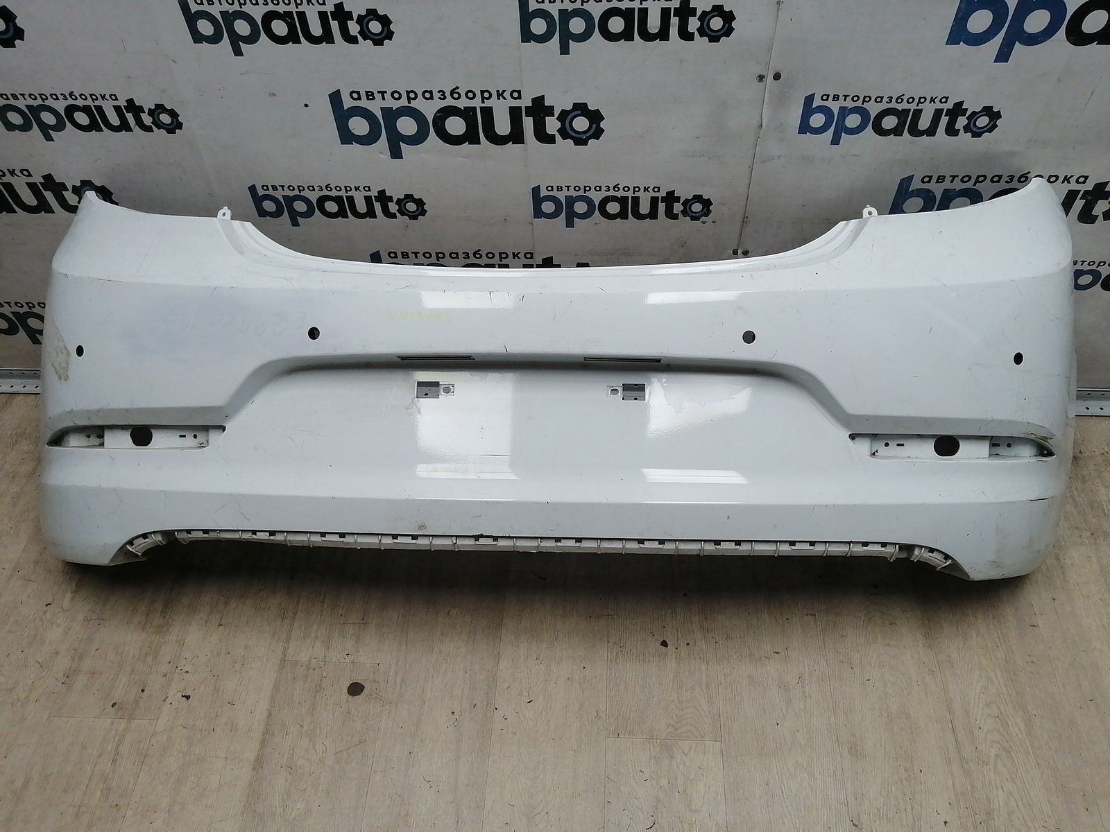 Пример детали Бампер задний; под паркт. (86611-4L700); Hyundai Solaris I рест. HB (2014- 2016) /AA045616/ БУ; Оригинал; Р1, Мелкий дефект; 
