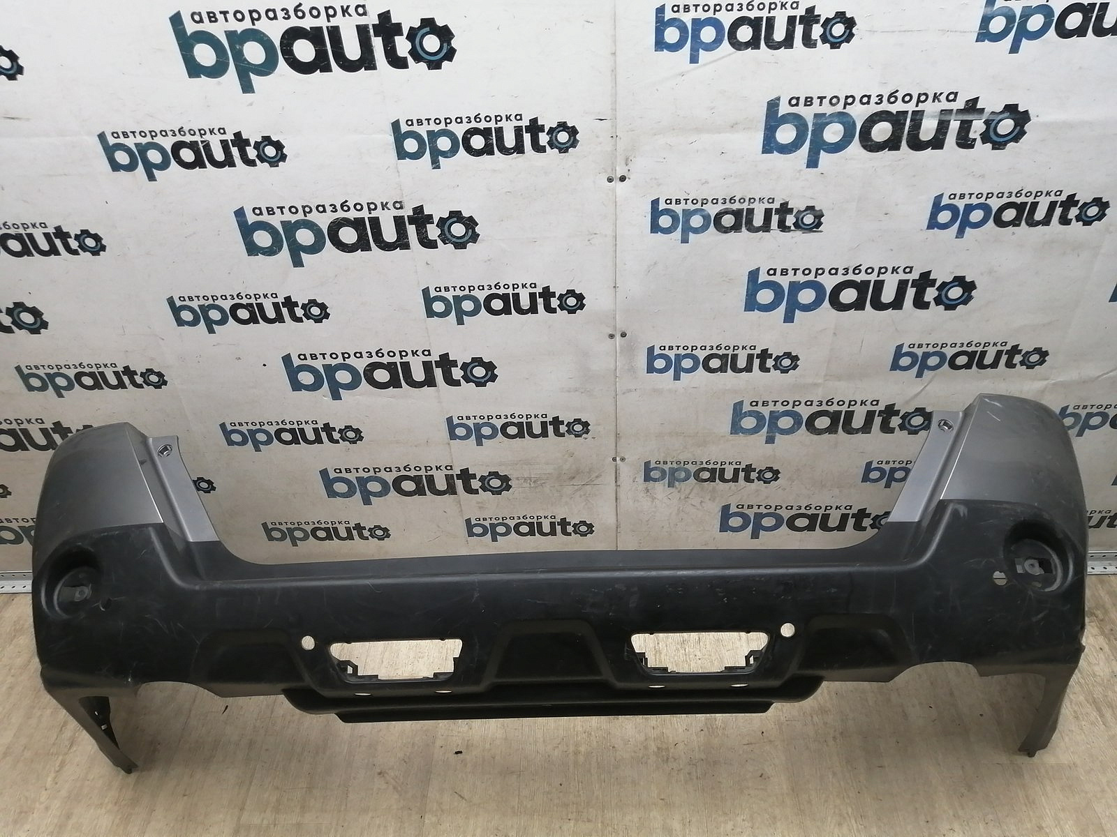 Пример детали Бампер задний; под паркт. (85022-JU14H); Nissan X-Trail II (T31) (2007-2011), II (T31) рест. (2011-2015) /BA000203/ БУ; Оригинал; Р1, Мелкий дефект; 