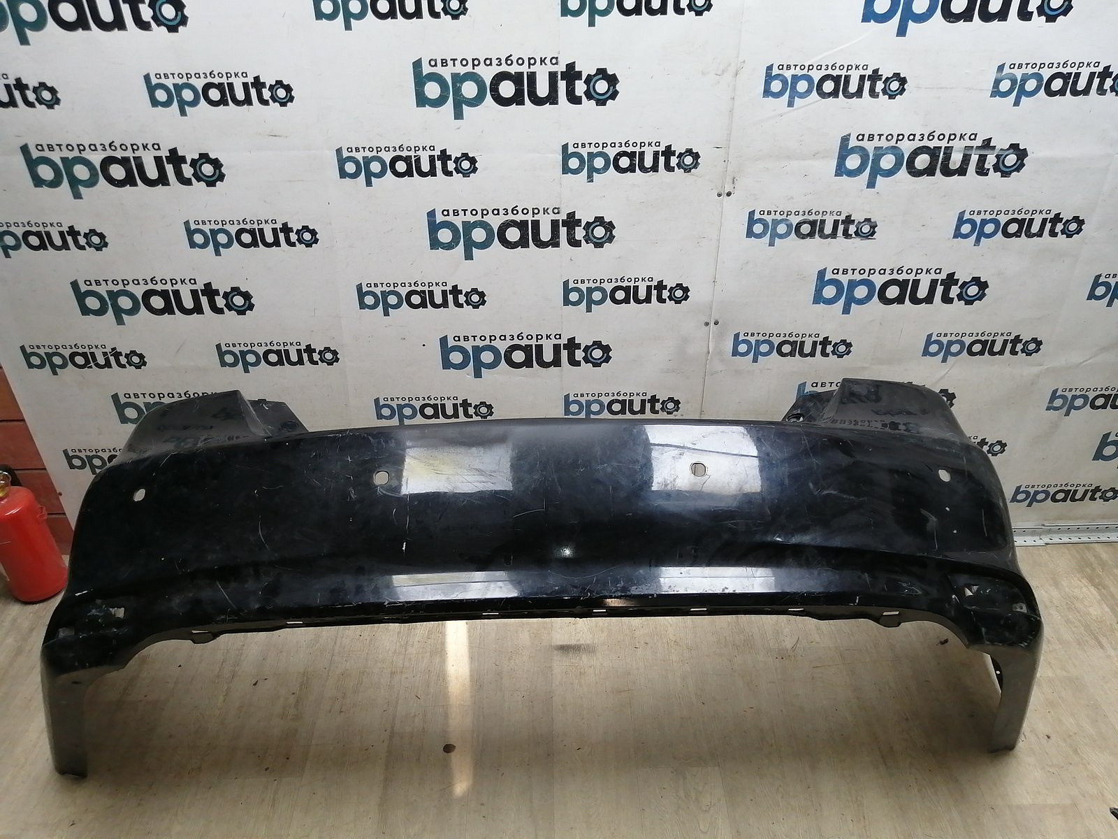 Пример детали Бампер задний; под паркт. (52159-06A30); Toyota Camry 55 рест. (2014 — 2017), 55 рест.2 (2017 — 2018) /AA045419/ БУ; Оригинал; Р2, Удовлетворительное; 