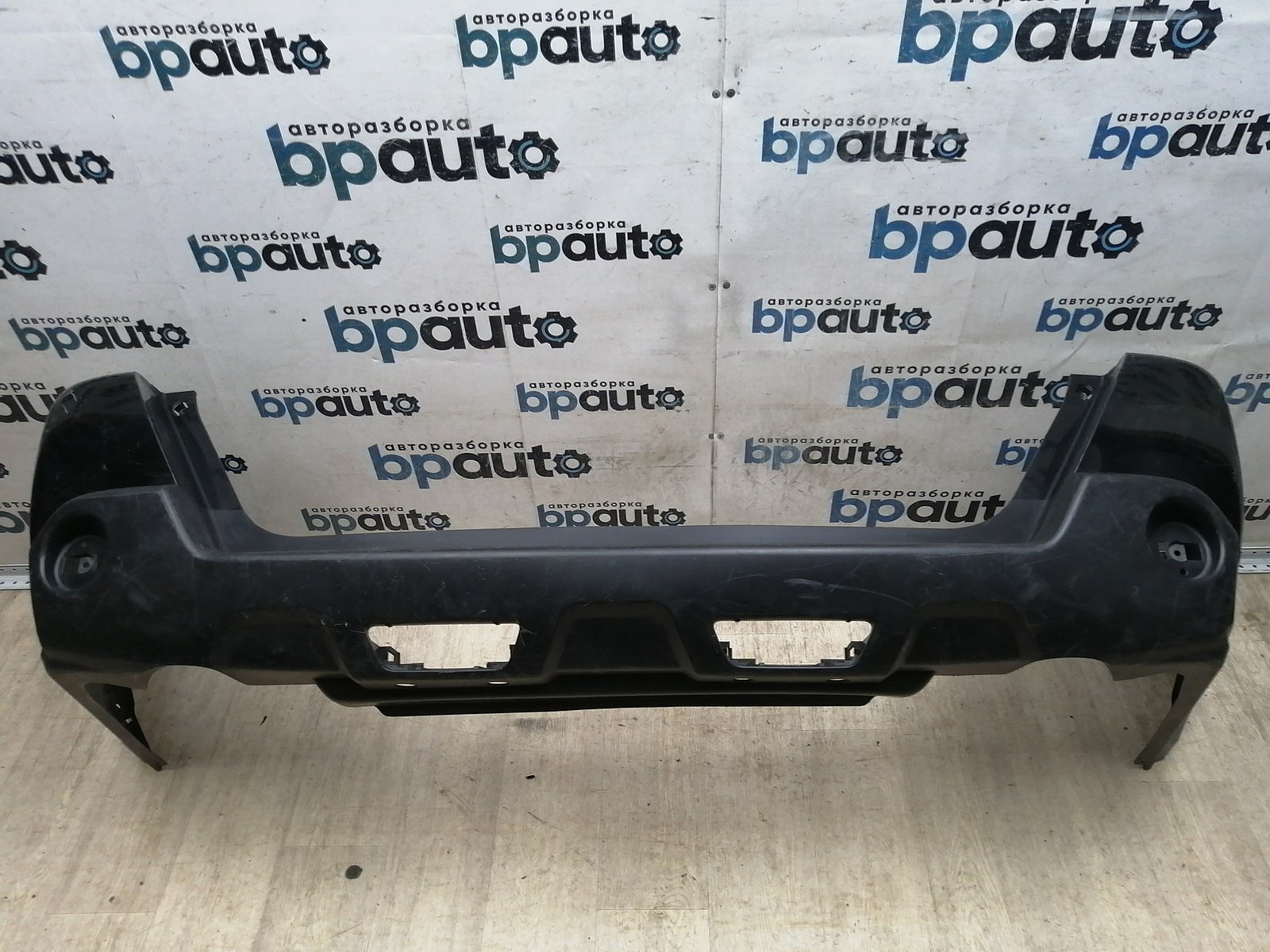 Пример детали Бампер задний; без паркт. (85022-JU14H); Nissan X-Trail II (T31) (2007-2011), II (T31) рест. (2011-2015) /BA000205/ БУ; Оригинал; Р1, Мелкий дефект; 