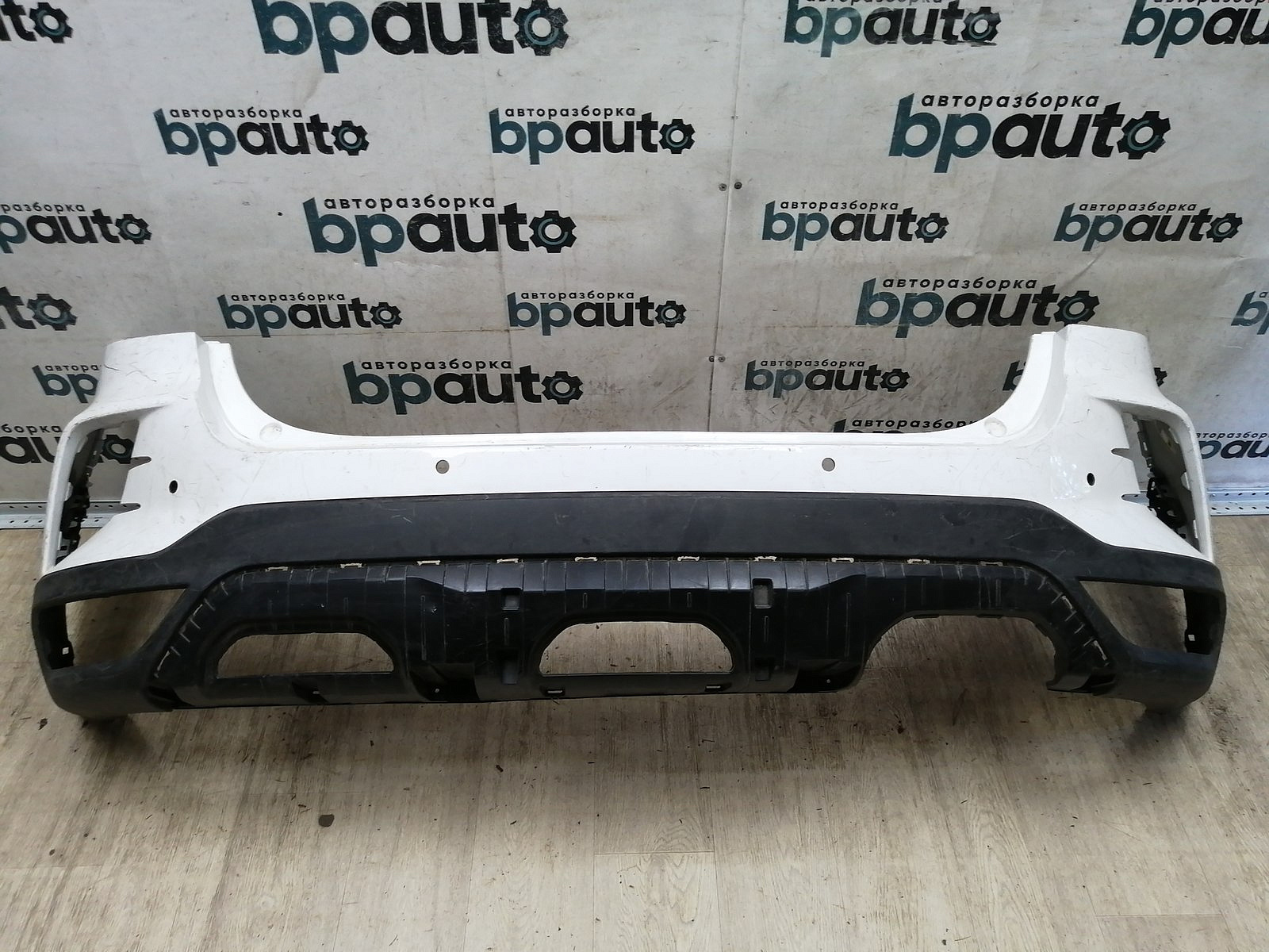 Пример детали Бампер задний (86611-H0900); Kia Rio IV рест. X-Line HB (2020- н.в.) /AA044382/ БУ; Оригинал; Р1, Мелкий дефект; 