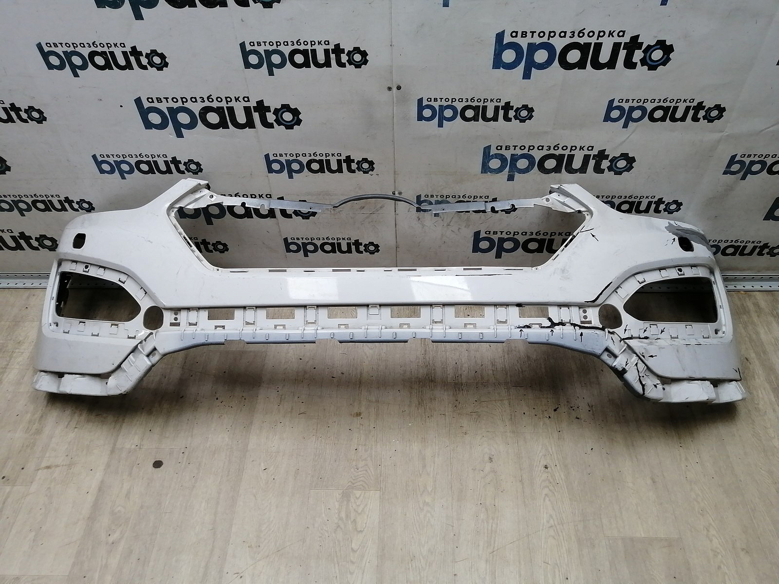 Пример детали Бампер передний; без паркт.; под омыват. (86511-2W000); Hyundai Santa Fe III (2012 - 2015) /AA044979/ БУ; Оригинал; Р2, Удовлетворительное; 