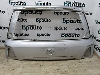 Пример детали Крышка багажника верхняя (67005-60D51); Toyota Land Cruiser 200 рест. (2012 — 2015) /AA011207/ БУ; Оригинал; Р2, Удовлетворительное; 