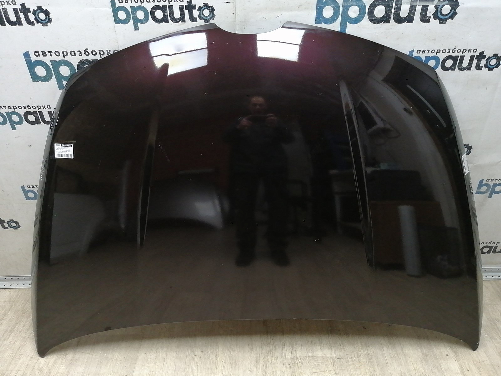 Пример детали Капот (EGY15231XD); Mazda CX-7 I (2006-2009), I рест. (2009-2012) /AA045200/ БУ; Оригинал; Р1, Мелкий дефект; (28W) Темно-красный перламутр (Бордовый)