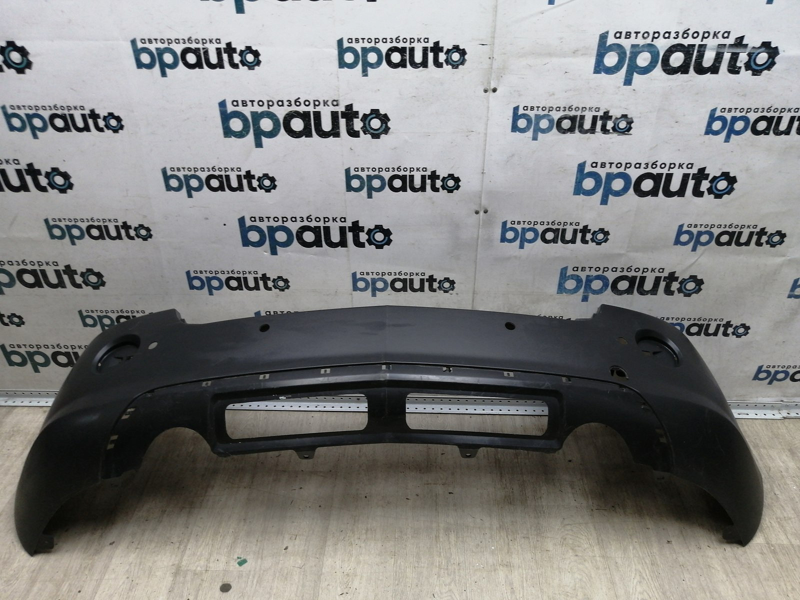 Пример детали Бампер задний; под паркт. (96660231); Opel Antara (2007 - 2011), рест. (2012 - 2015) /AA045070/ БУ; Оригинал; Р1, Мелкий дефект;