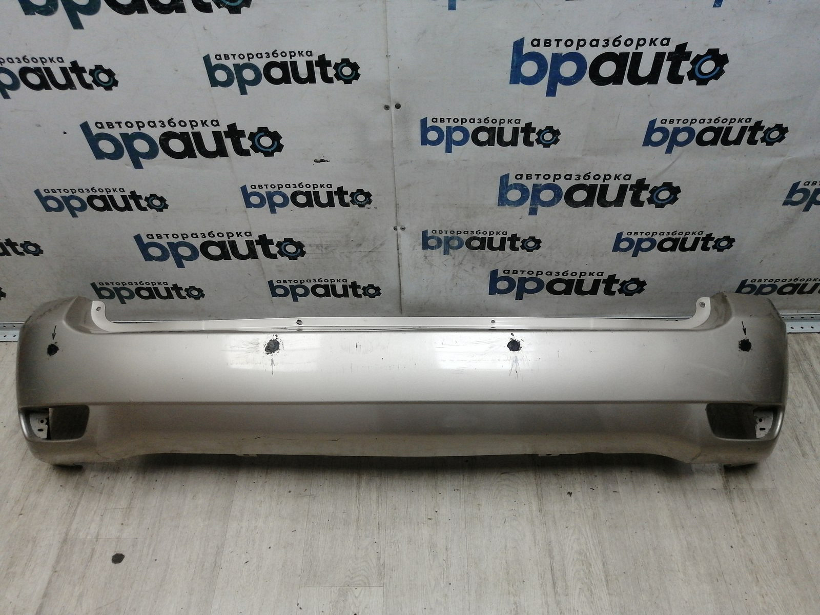 Пример детали Бампер задний; без паркт. (86611-10000); Hyundai Matrix I рест. 2 (2008-2010) /AA046211/ БУ; Оригинал; Р2, Удовлетворительное; ДхШхВ 1,75х0,45х0,38; 
