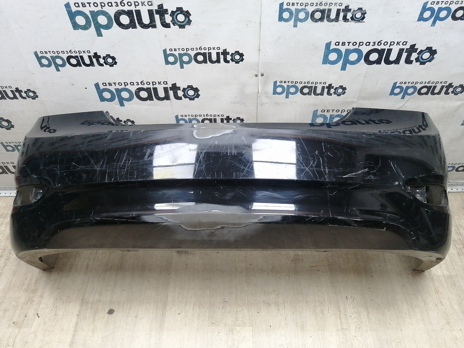 Пример детали Бампер задний; без паркт. (86611-4L000); Hyundai Accent IV (2010-2017), Solaris I Sedan (2010- 2014) /AA045611/ БУ; Оригинал; Р1, Мелкий дефект; 