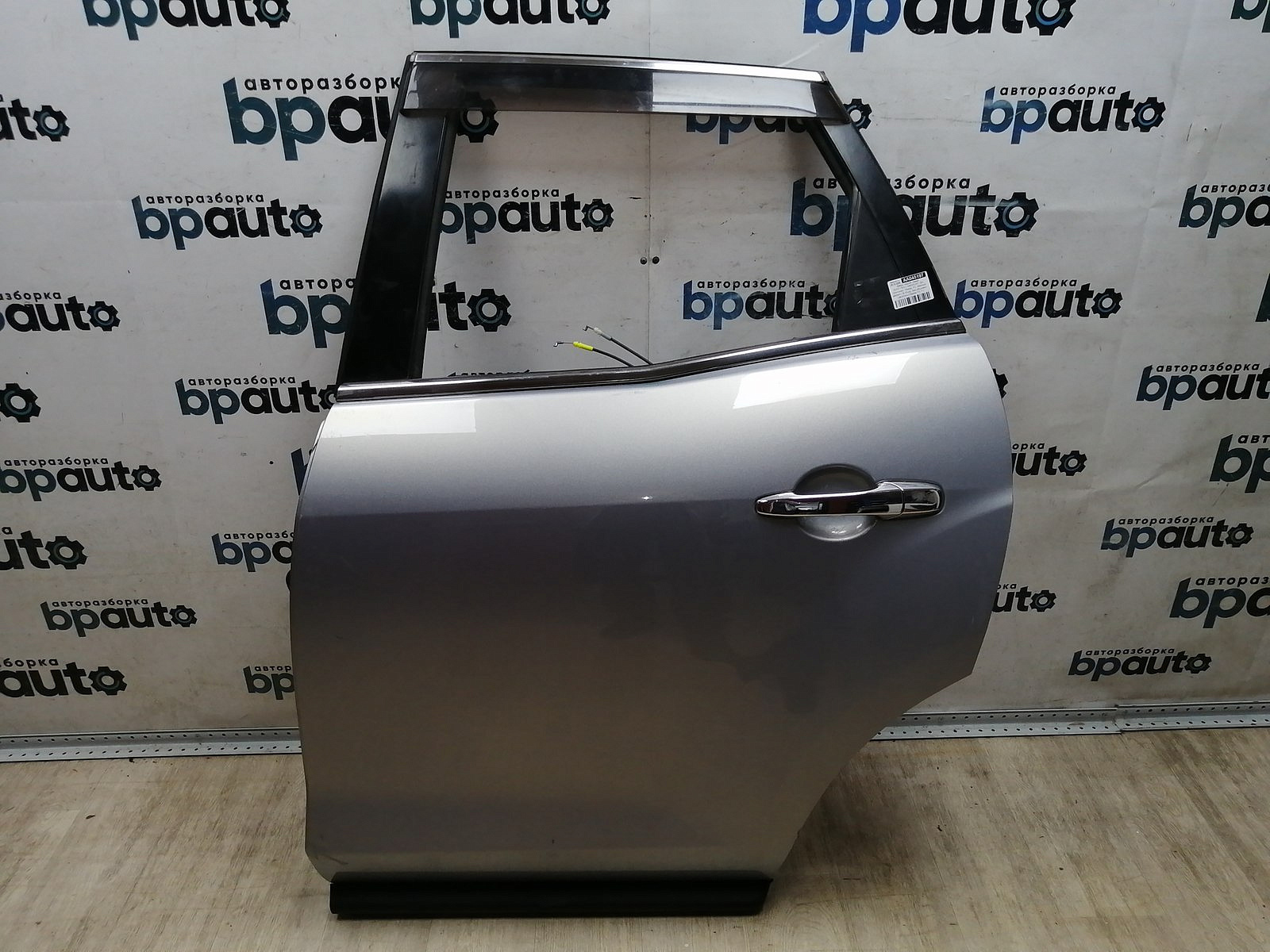 Пример детали Дверь задняя левая (EGY17302); Mazda CX-7 I (2006-2009), I рест. (2009-2012) /AA045197/ БУ; Оригинал; Р1, Мелкий дефект; 