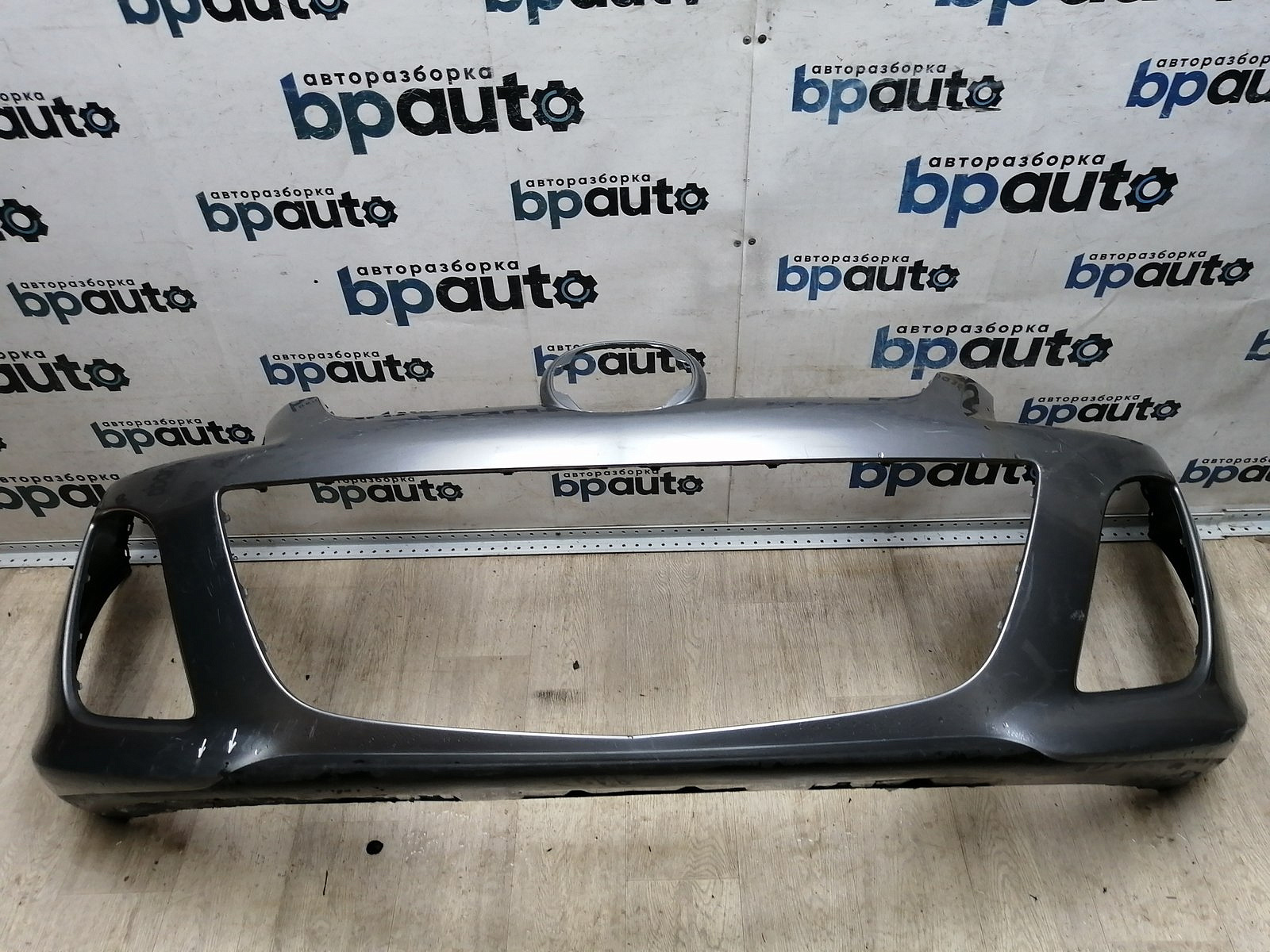 Пример детали Бампер передний; без паркт.; под омыват. (EH44-50031); Mazda CX-7 I рест. (2009-2012) /AA045767/ БУ; Оригинал; Р1, Мелкий дефект; 