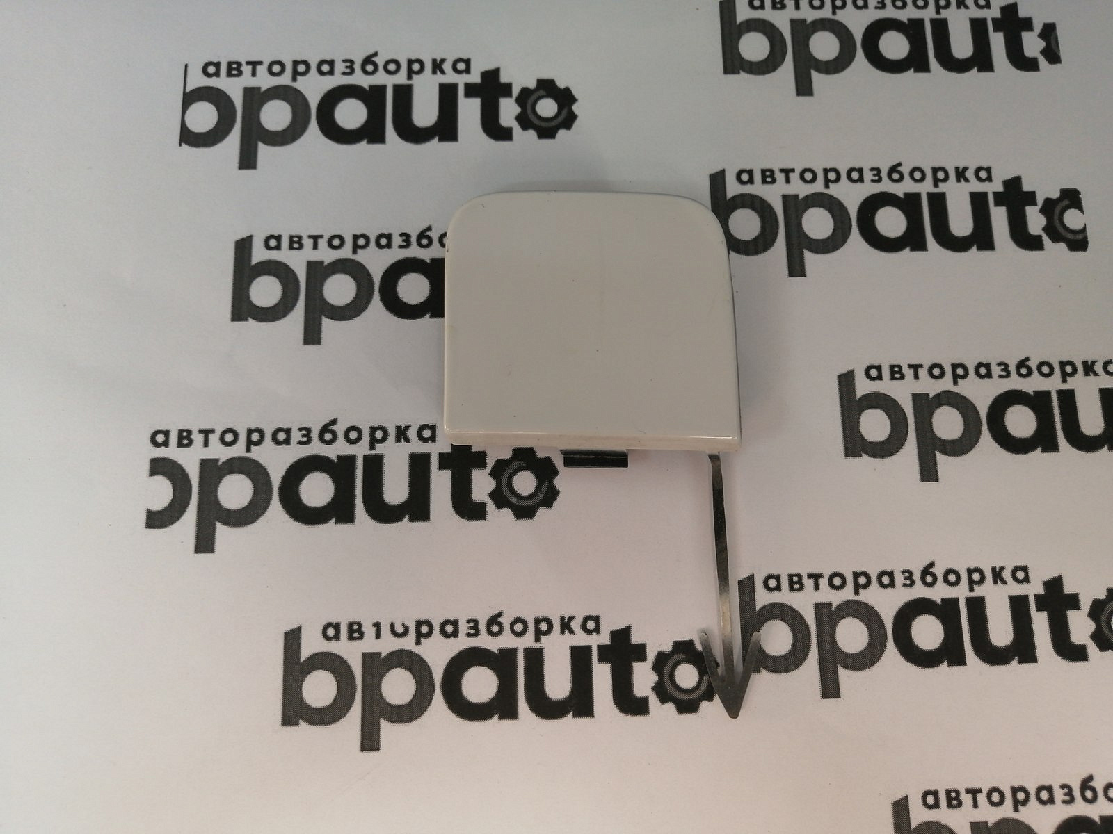 Пример детали Заглушка букс. крюка  заднего бампера (3AE807441A); Volkswagen Passat B7 Sedan (2011- 2014) /AA045028/ БУ; Оригинал; Р0, Хорошее; 