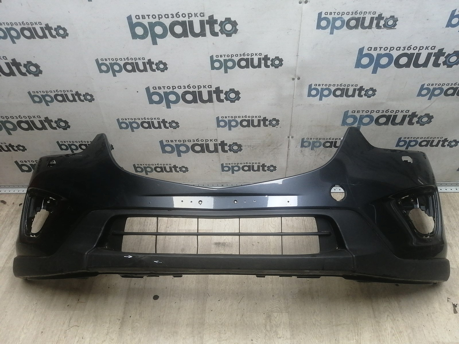 Пример детали Бампер передний; без паркт.; под омыват. (KD45-50031); Mazda CX-5 I (2011-2015), I рест. (2015-2017) /AA045755/ БУ; Оригинал; Р1, Мелкий дефект; 