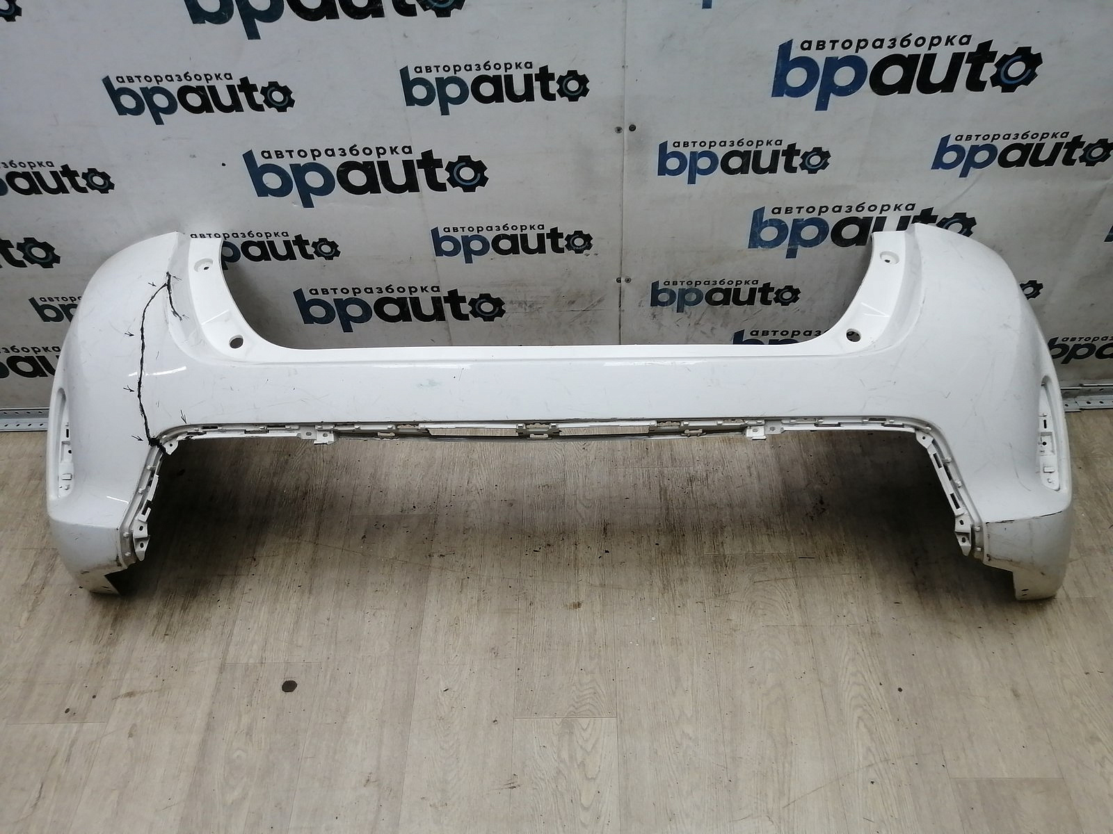 Пример детали Бампер задний; без паркт. (52159-02840); Toyota Auris II (2013 — 2015) /AA044957/ БУ; Оригинал; Р2, Удовлетворительное; 