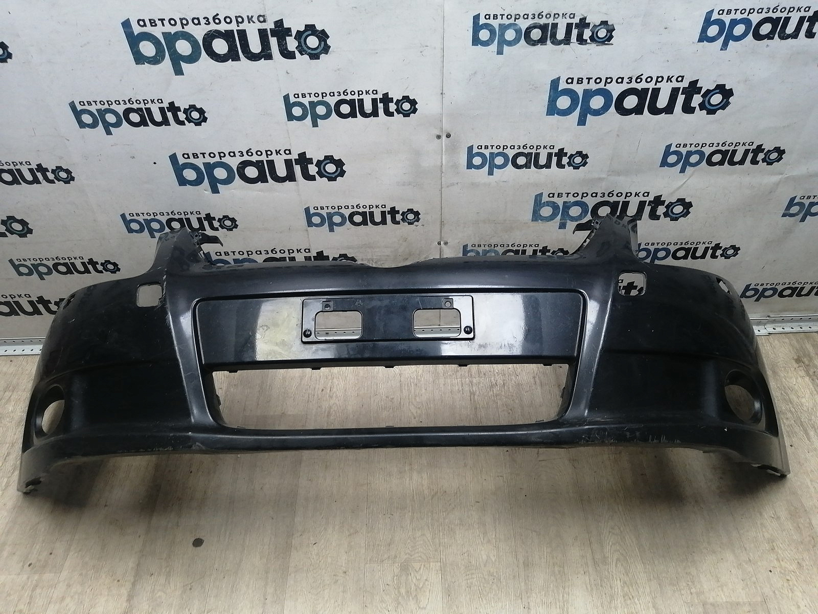 Пример детали Бампер передний; без паркт.; под омыват. (52119-05190); Toyota Avensis III Sedan (2009 - 2011), III Wagon (2009 - 2011) /BA000184/ БУ; Оригинал; Р1, Мелкий дефект; 
