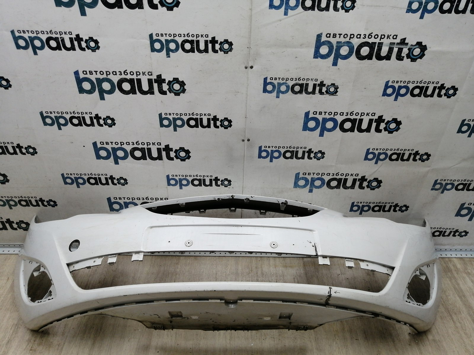 Пример детали Бампер передний; без паркт.; без омыват. (13267699); Opel Meriva B (2010 - 2014) /AA044717/ БУ; Оригинал; Р1, Мелкий дефект; 