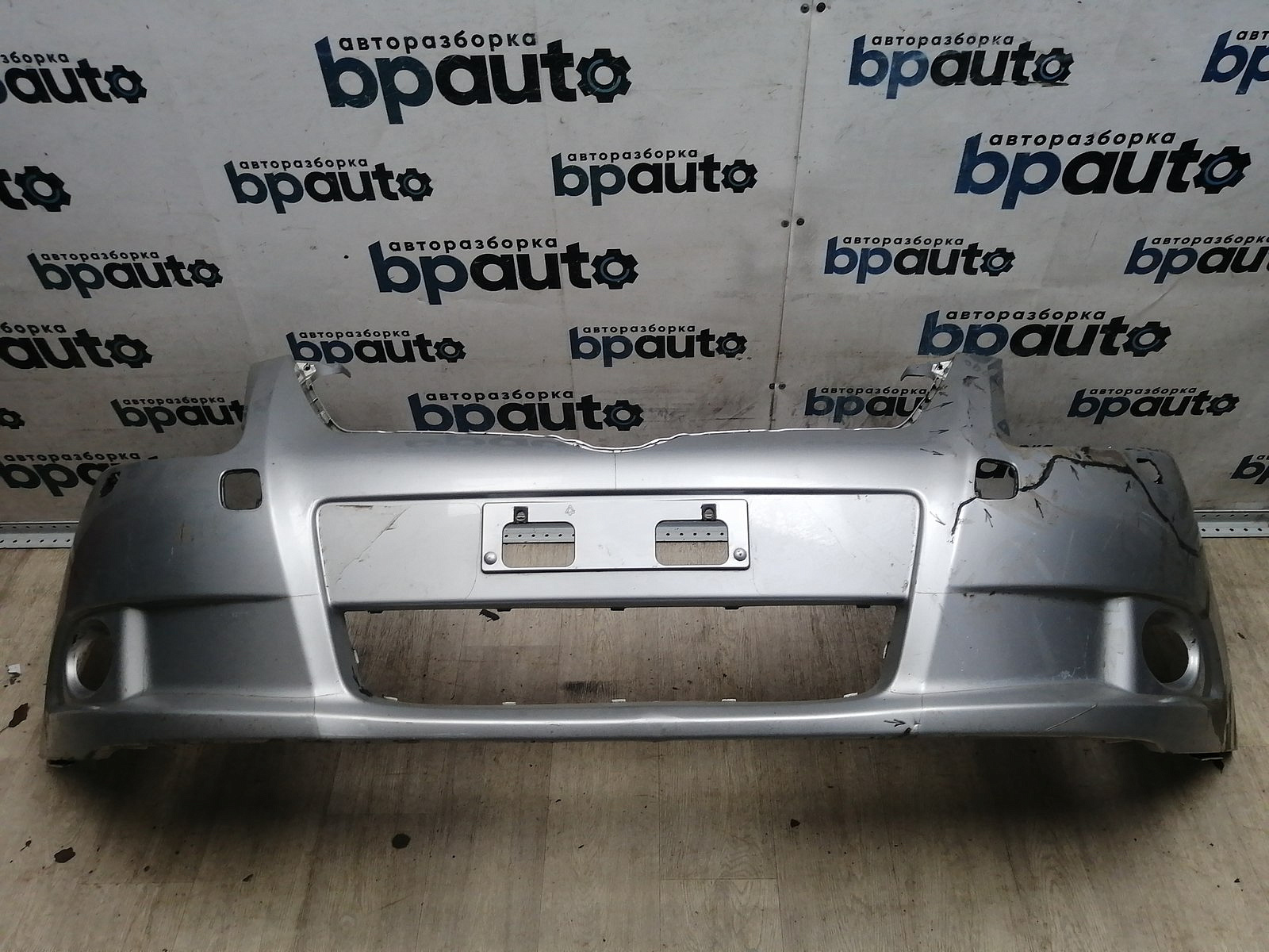 Пример детали Бампер передний; без паркт.; под омыват. (52119-05190); Toyota Avensis III Sedan (2009 - 2011), III Wagon (2009 - 2011) /AA045637/ БУ; Оригинал; Р2, Удовлетворительное; 