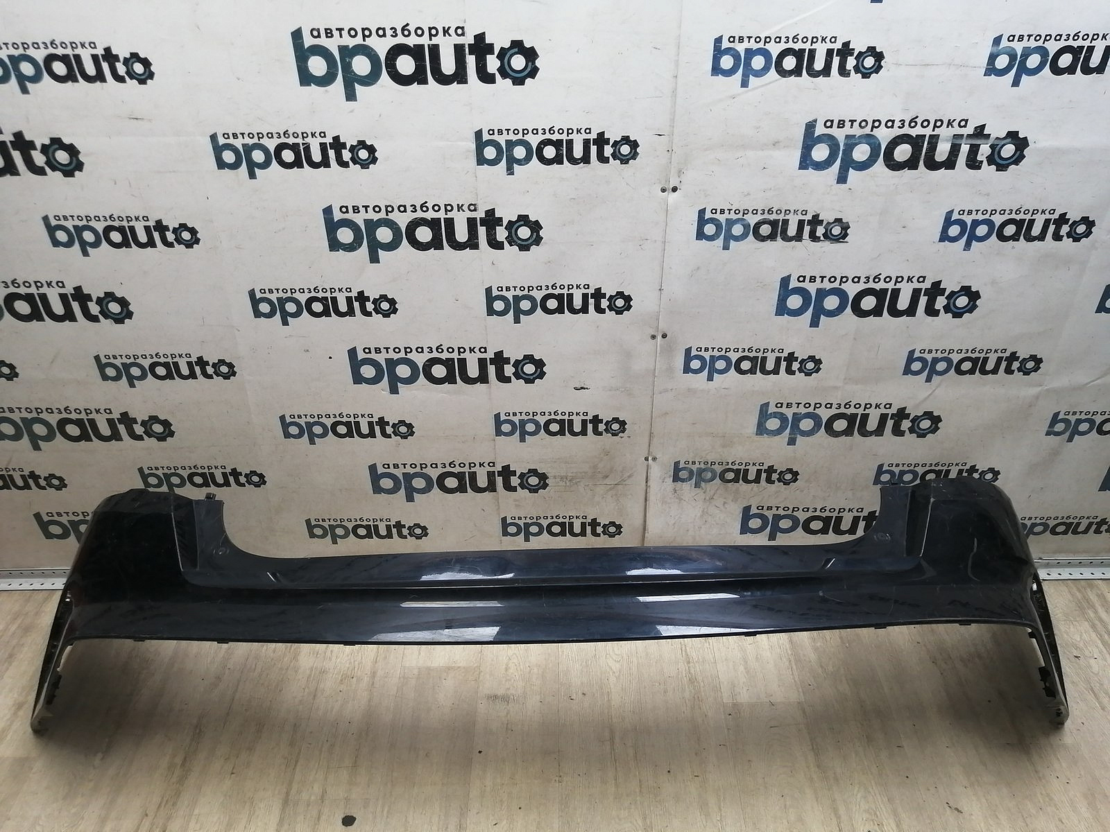 Пример детали Бампер задний- верхняя часть (86611-P2000); Kia Sorento IV (2020-2023) /AA046173/ БУ; Оригинал; Р1, Мелкий дефект; 