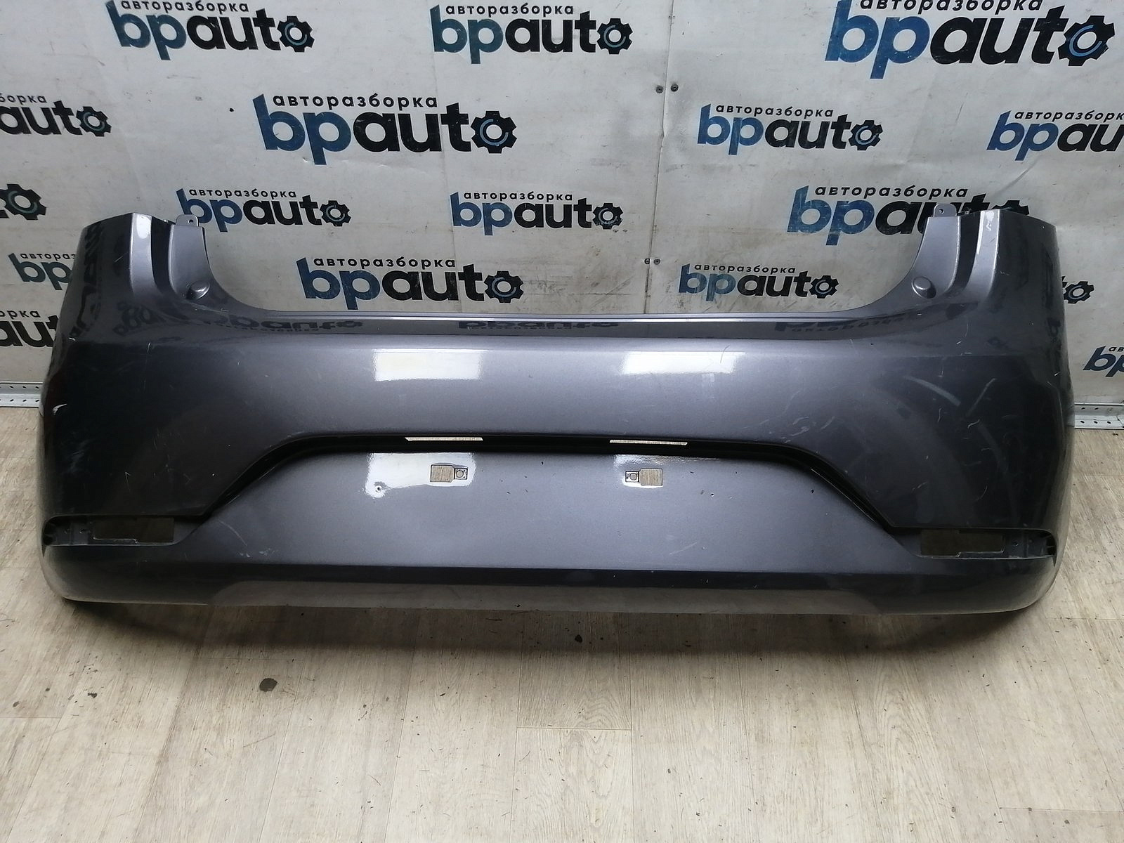 Пример детали Бампер задний; без паркт. (86611-4Y200); Kia Rio III HB (2011- 2015) /AA045617/ БУ; Оригинал; Р1, Мелкий дефект; 