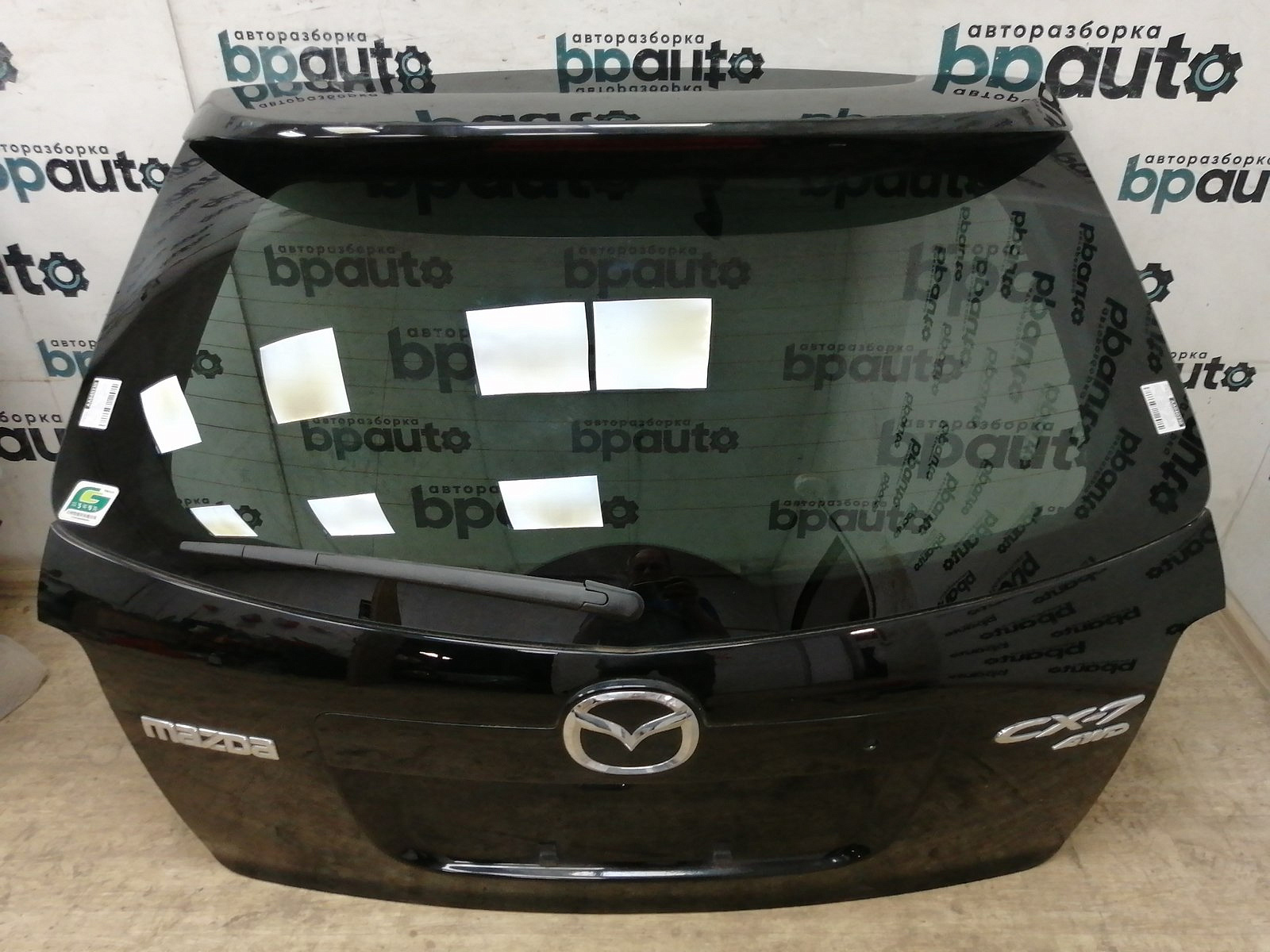 Пример детали Крышка багажника (EGY56202XB); Mazda CX-7 I (2006-2009), I рест. (2009-2012) /AA040230/ БУ; Оригинал; Р0, Хорошее; (A3F) Чёрный