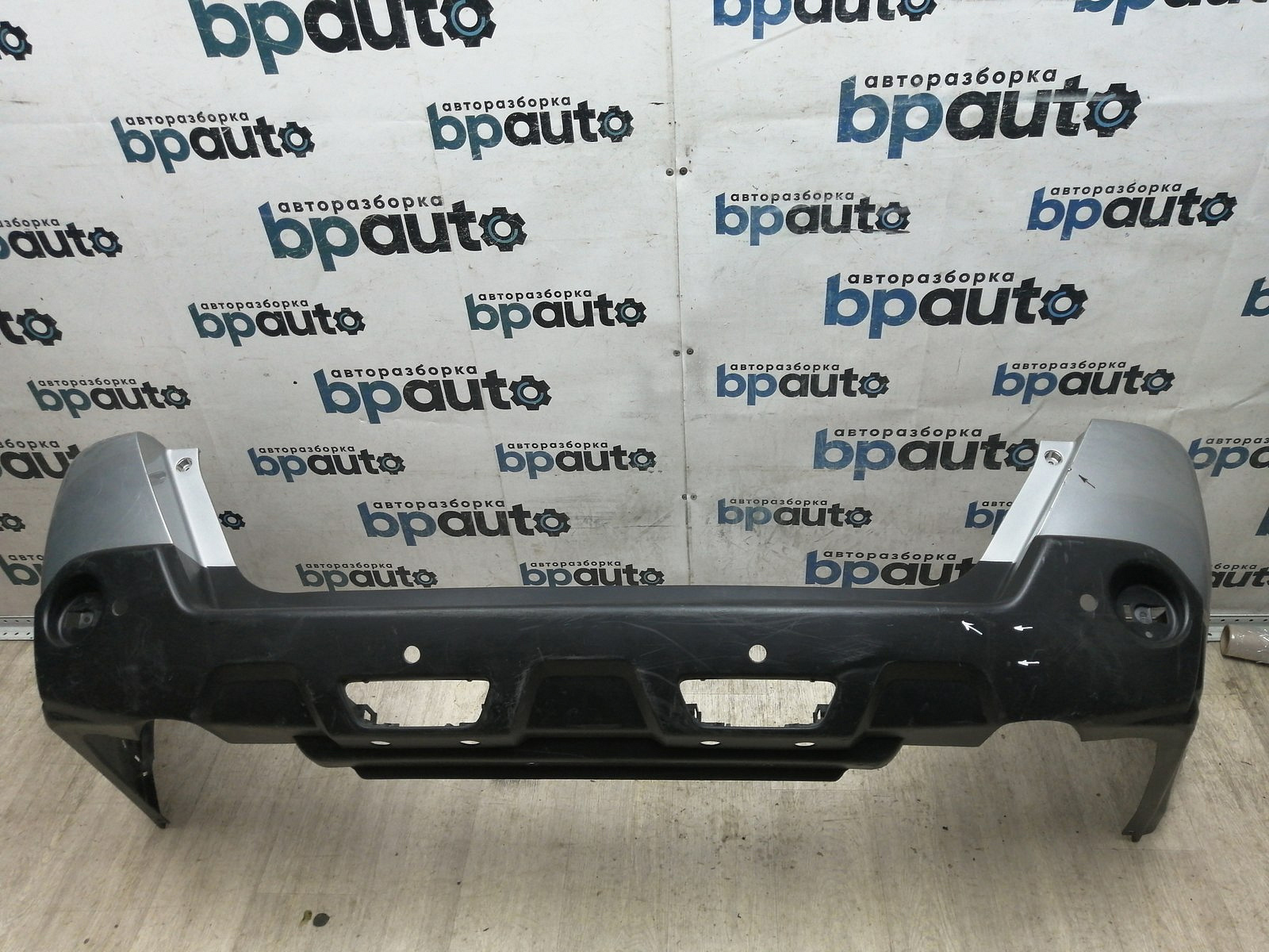 Пример детали Бампер задний; под паркт. (85022-JU14H); Nissan X-Trail II (T31) (2007-2011), II (T31) рест. (2011-2015) /BA000193/ БУ; Оригинал; Р1, Мелкий дефект; 
