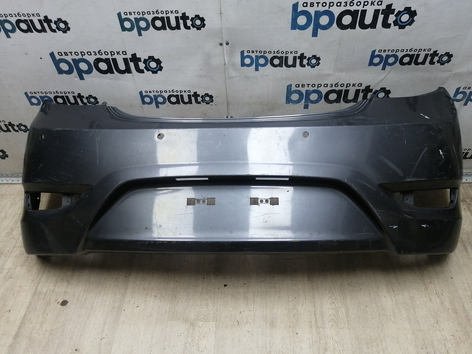 Пример детали Бампер задний; под паркт. (86611-4L200); Hyundai Solaris I HB (2010- 2014) /AA045615/ БУ; Оригинал; Р1, Мелкий дефект; 