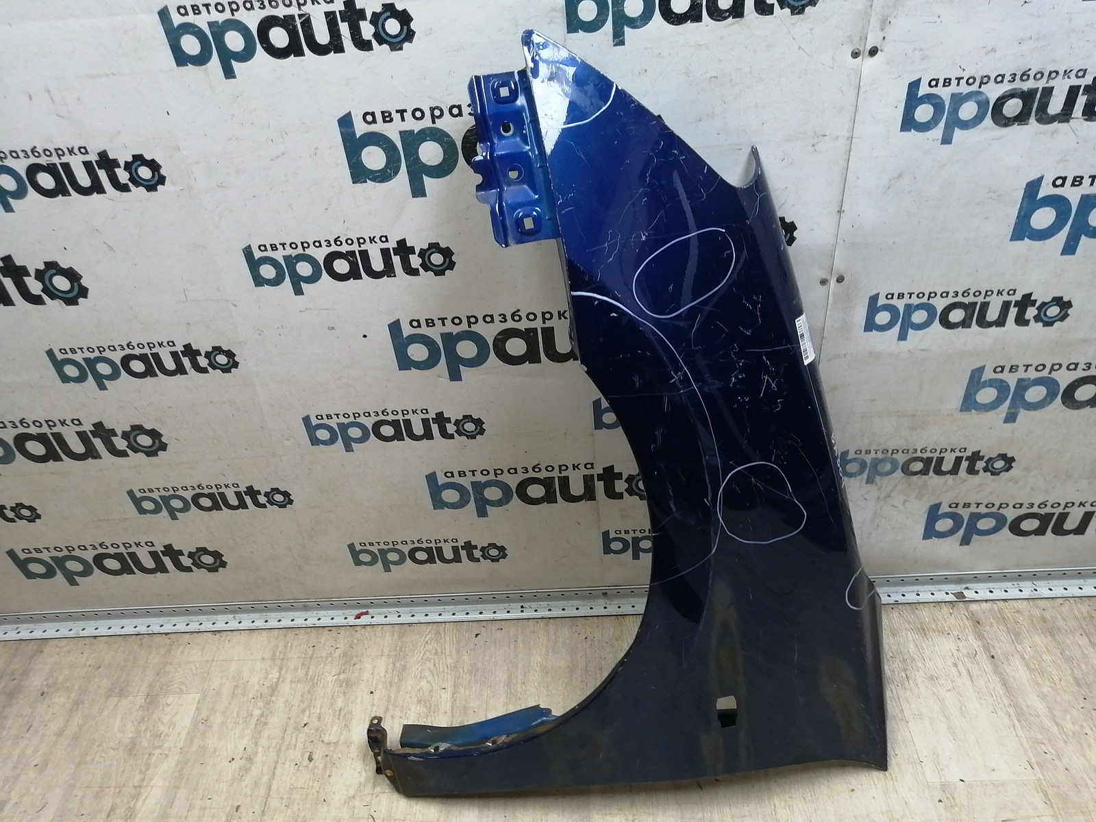 Пример детали Крыло переднее левое (63101-4AA8B); Nissan Almera III (G15) (2012-2018) /BA000304/ БУ; Оригинал; Р2, Удовлетворительное; 