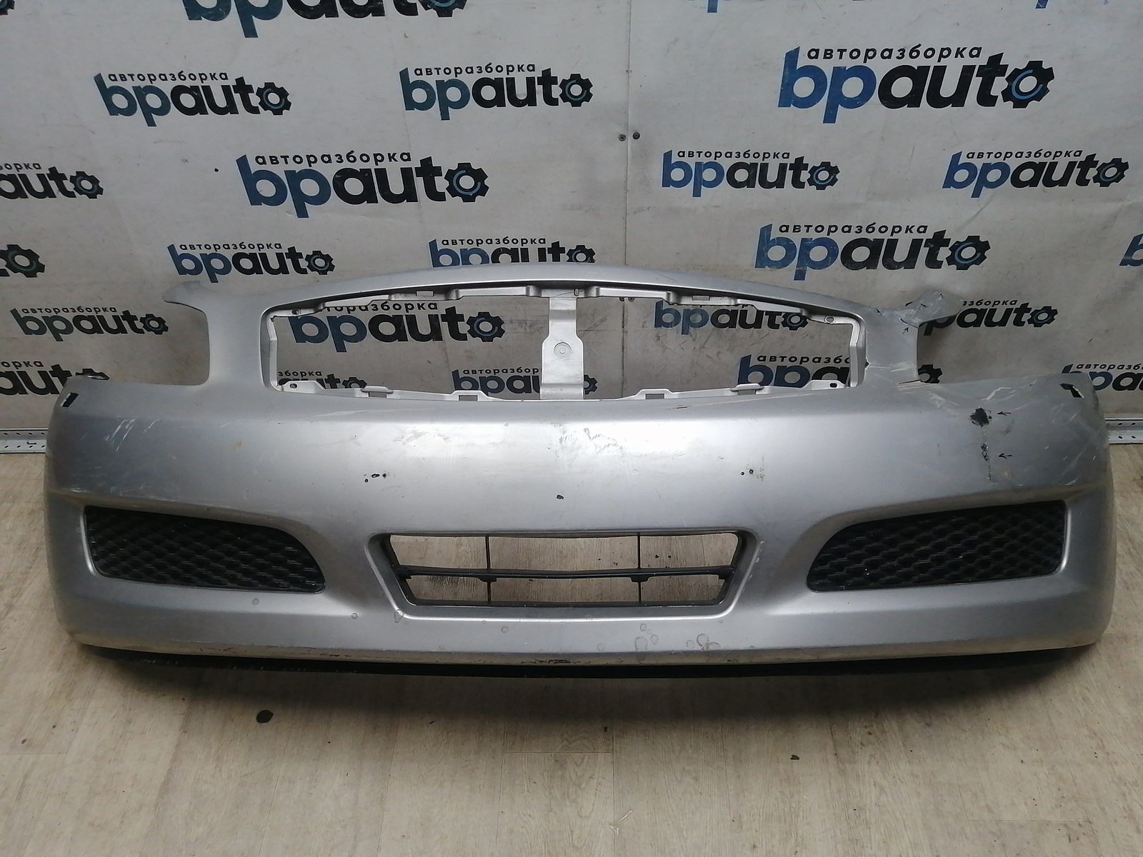 Пример детали Бампер передний, до 2010г; без паркт.; под омыват. (62022-JK60H); Infiniti G (2006-2013) /AA045731/ БУ; Неоригинал; Р2, Удовлетворительное; 