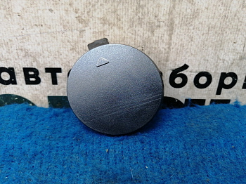 Фотография детали AA031220; Заглушка буксир. крюка переднего бампера (86517-4Y000) для Kia Rio/БУ; Оригинал; Р1, Мелкий дефект; . Фото номер 1
