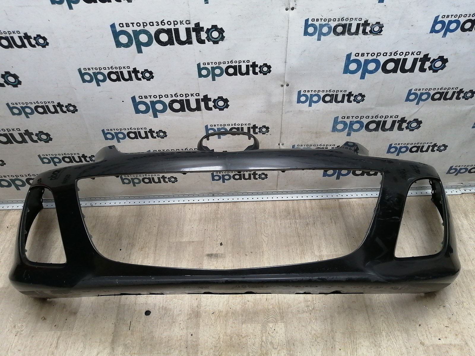 Пример детали Бампер передний; без паркт.; под омыват. (EH44-50031); Mazda CX-7 I рест. (2009-2012) /AA045769/ БУ; Оригинал; Р1, Мелкий дефект; 