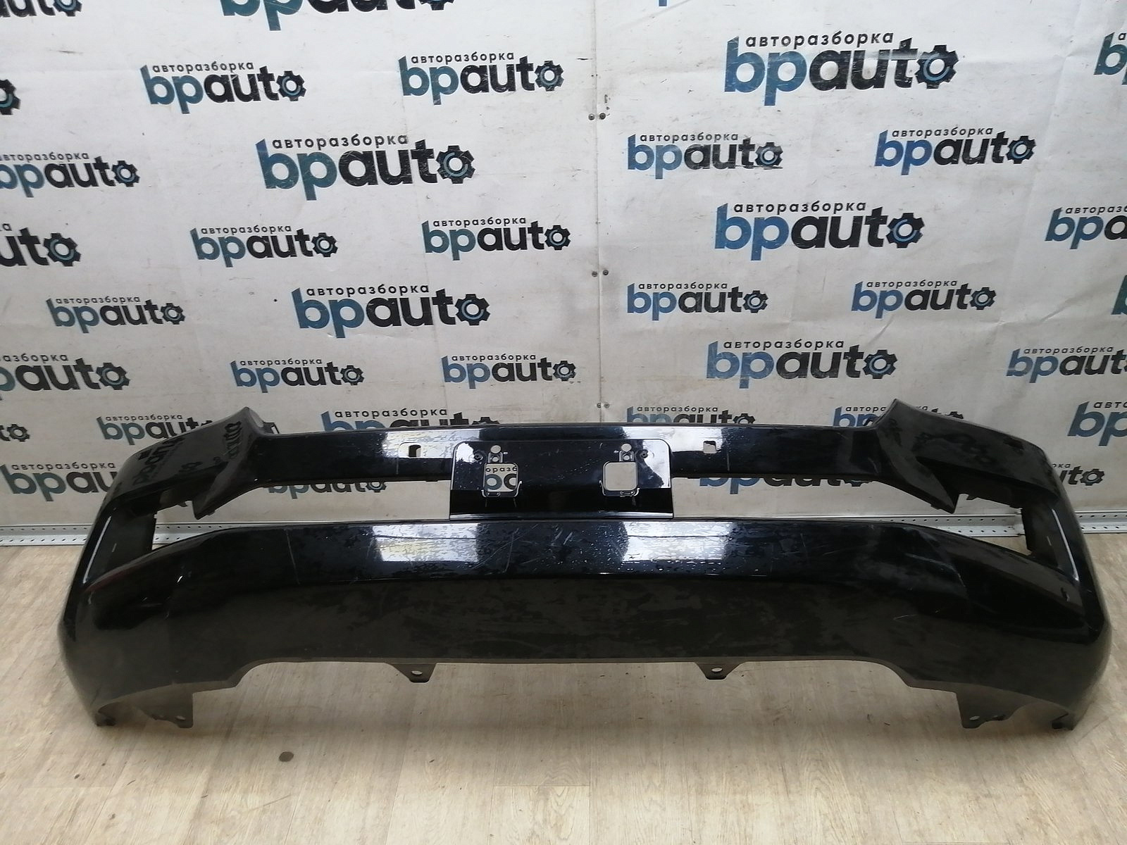 Пример детали Бампер передний; под паркт.; под омыват. (52119-60M50); Toyota Land Cruiser 200 рест.2 (2015 - н.в.) /AA045329/ БУ; Оригинал; Р1, Мелкий дефект; 