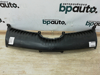 Фотография детали AA002996; Кронштейн крепления решетки радиатора (TD11-50-0K1C) для Mazda CX-9 I (2006-2012)/БУ; Оригинал; Р1, Мелкий дефект; . Фото номер 1