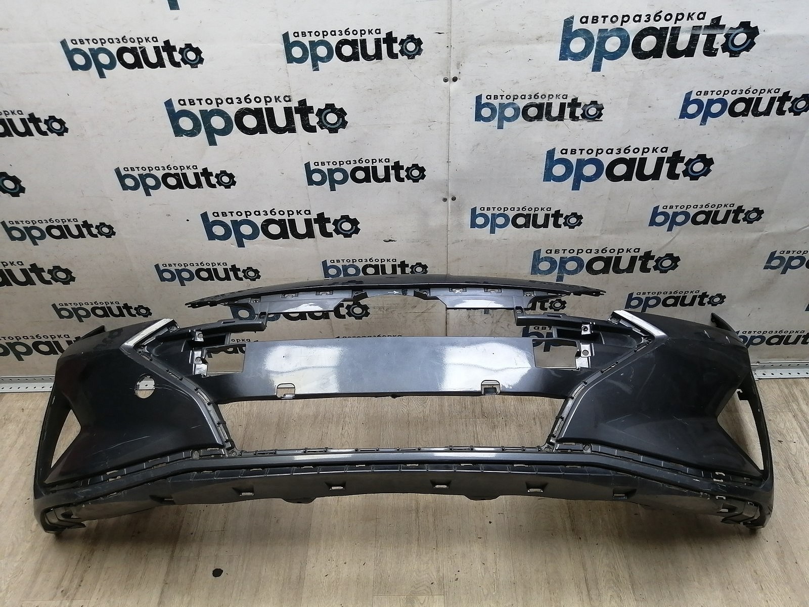 Пример детали Бампер передний; без паркт.; без омыват. (86511-F2AA0); Hyundai Elantra VI (AD) рест. (2018-2020) /AA046181/ БУ; Неоригинал; Р2, Удовлетворительное; ДхШхВ 1,82х0,7х0,6; 