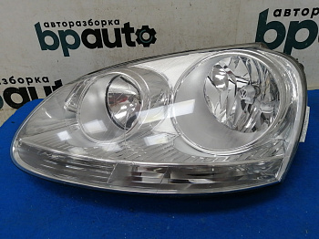 Пример детали Фара галоген левая, Светлый отраж. (1K6941005P); Volkswagen Golf V HB 5D (2003- 2008), V HB 3D (2003- 2008), V Wagon (2003- 2008), Jetta V (2005- 2010) /AA025067/ БУ; Оригинал; Р1, Мелкий дефект; 