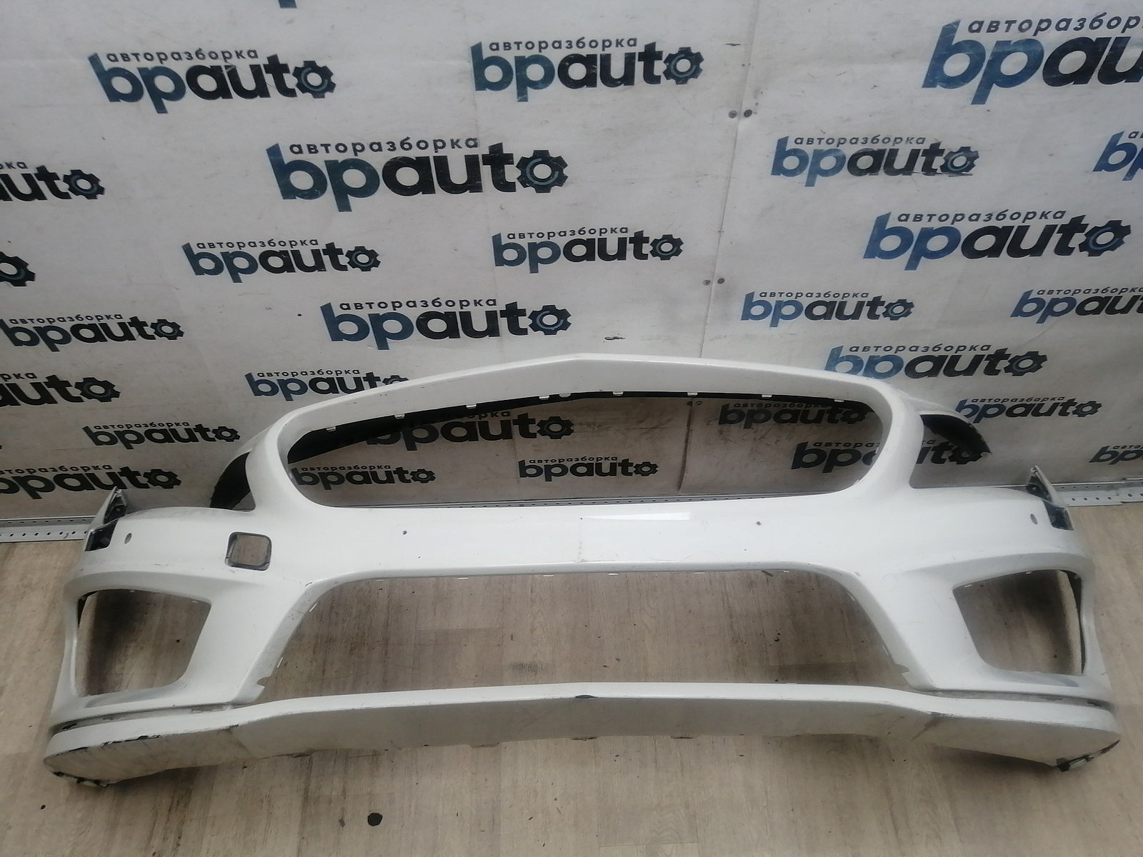 Фотография детали AA046197; Бампер передний AMG; под паркт.; под омыват. (A1178850825) для Mercedes-Benz CLA-klasse I (C117, X117) (2013-2016)/БУ; Оригинал; Р1, Мелкий дефект; . Фото номер 1