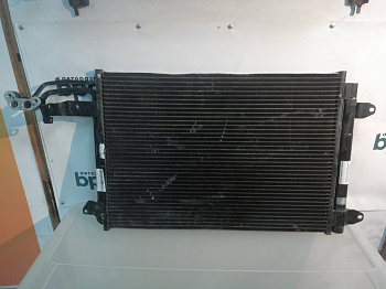 Пример детали Радиатор кондиционера (1K0 820 411 Q); Skoda Octavia II рест. Liftback (2008-2013), II рест. Wagon (2008-2013), Volkswagen Scirocco (2009 - 2014) /AA023401/ БУ; Оригинал; Р2, Удовлетворительное; 