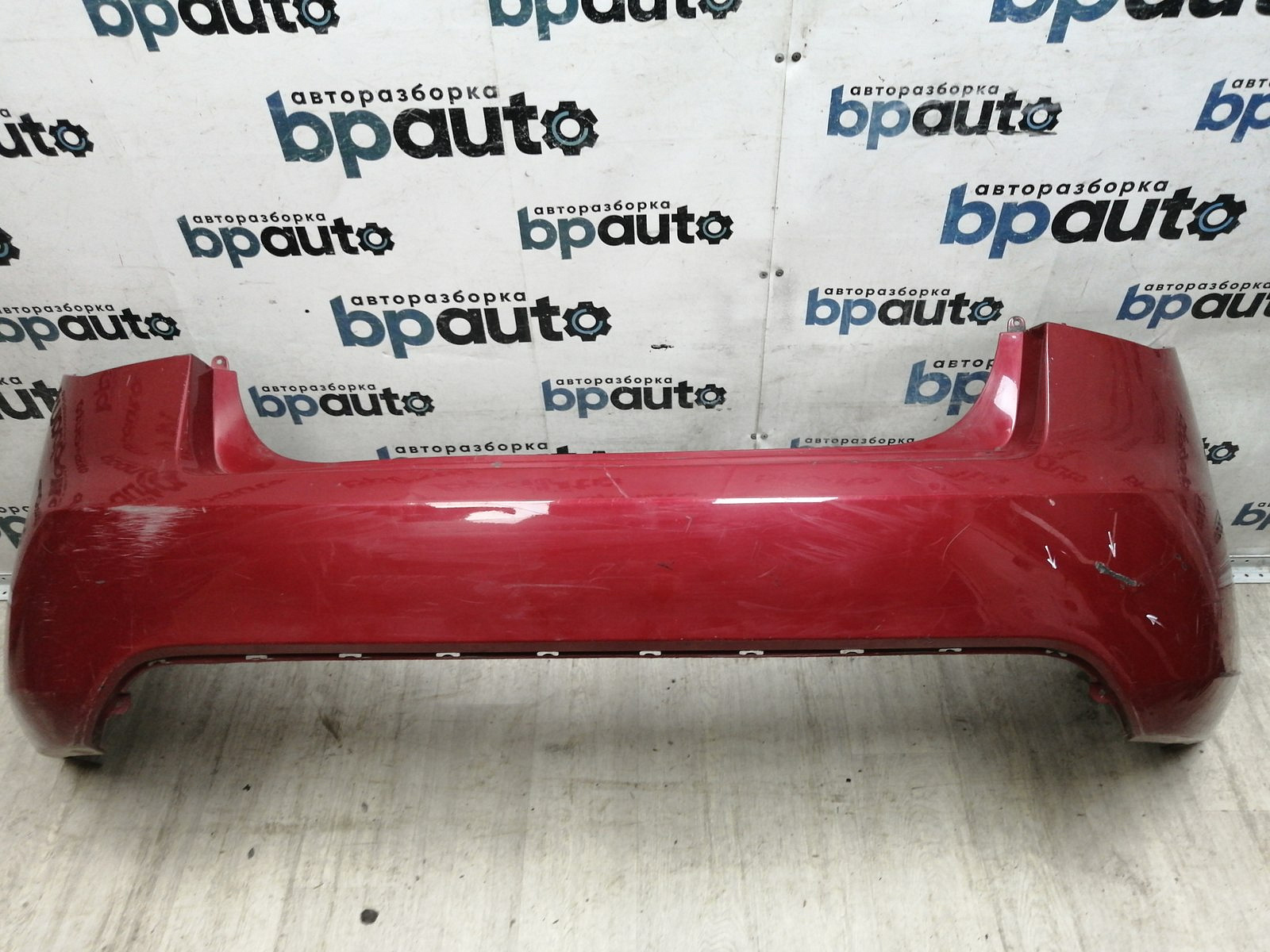 Фотография детали AA046244; Бампер задний; без паркт. (86611-1M000) для Kia Cerato II (2009-2013)/БУ; Оригинал; Р1, Мелкий дефект; . Фото номер 1