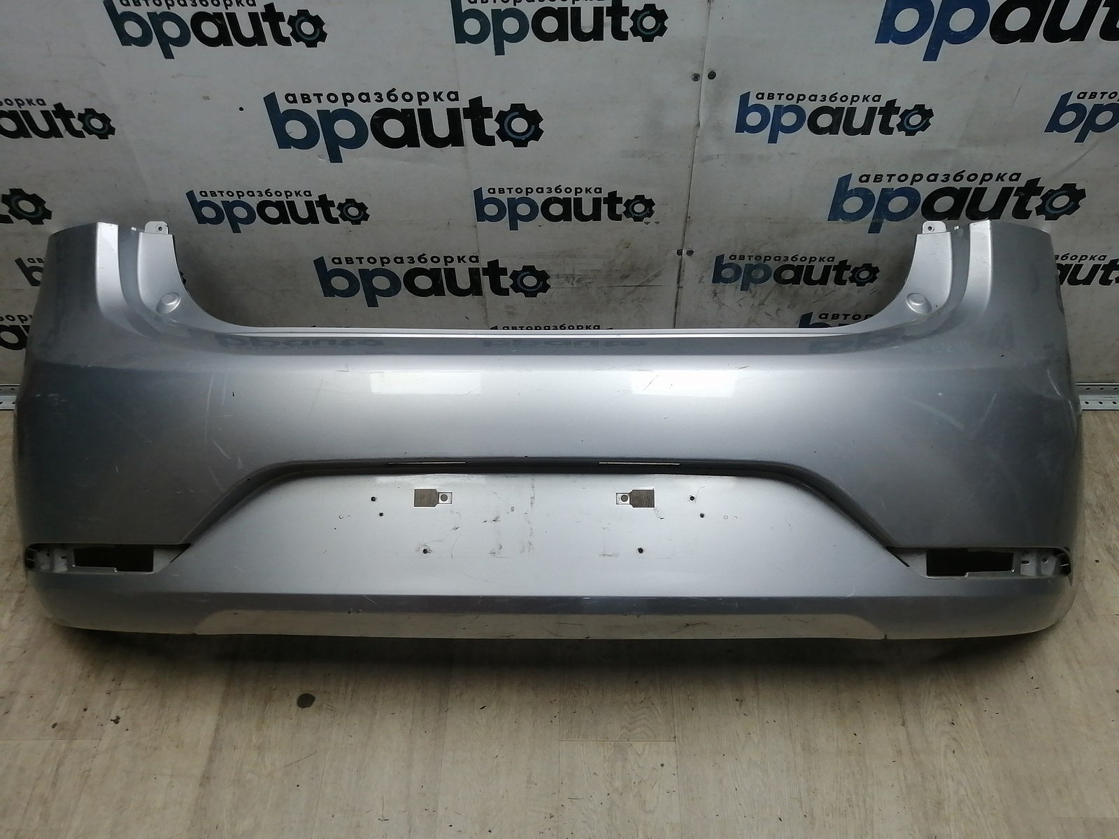 Пример детали Бампер задний; без паркт. (86611-4Y200); Kia Rio III HB (2011- 2015) /AA045618/ БУ; Оригинал; Р1, Мелкий дефект; 
