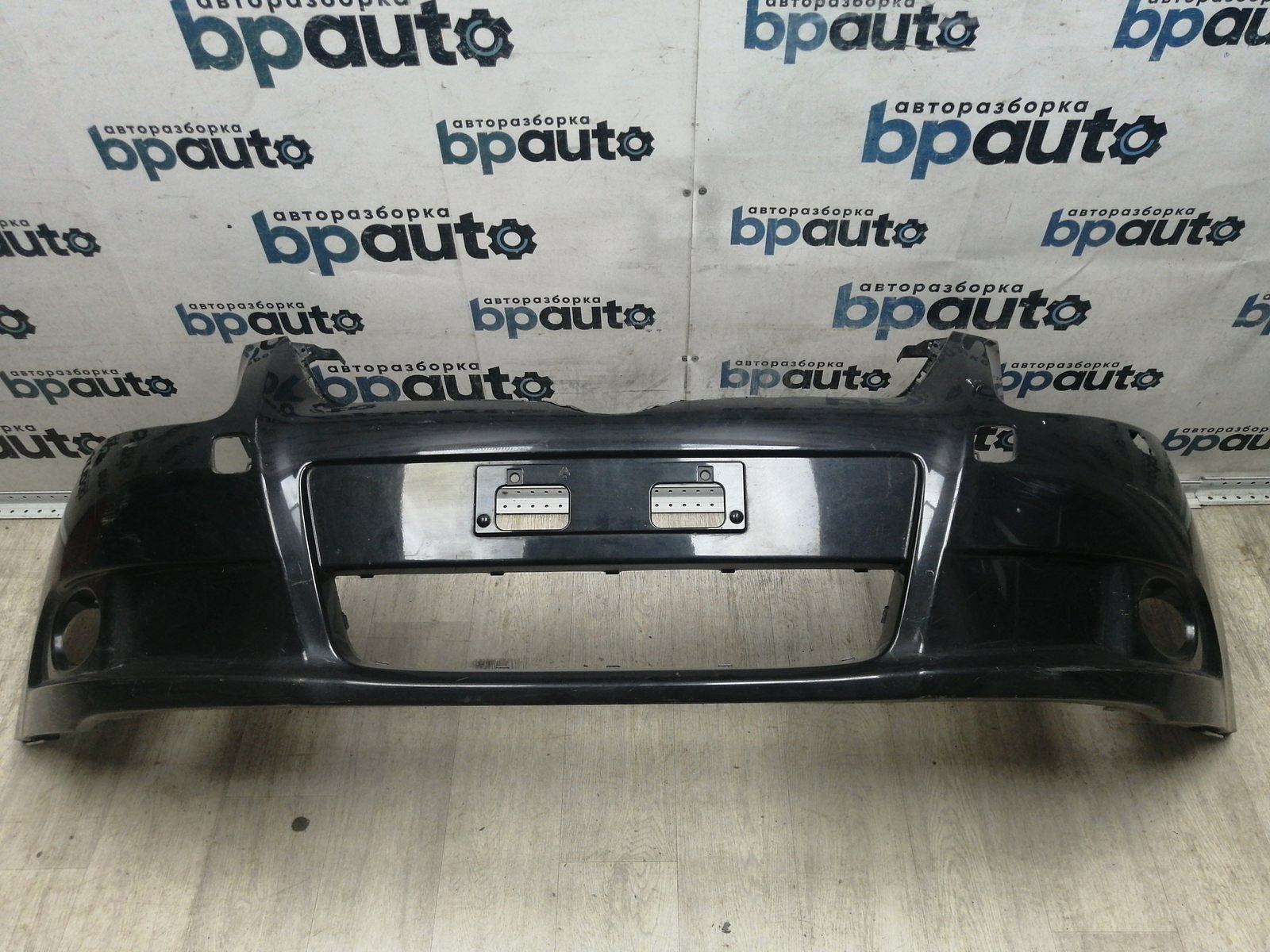 Пример детали Бампер передний; без паркт.; под омыват. (52119-05190); Toyota Avensis III Sedan (2009 - 2011), III Wagon (2009 - 2011) /BA000187/ БУ; Оригинал; Р1, Мелкий дефект; 