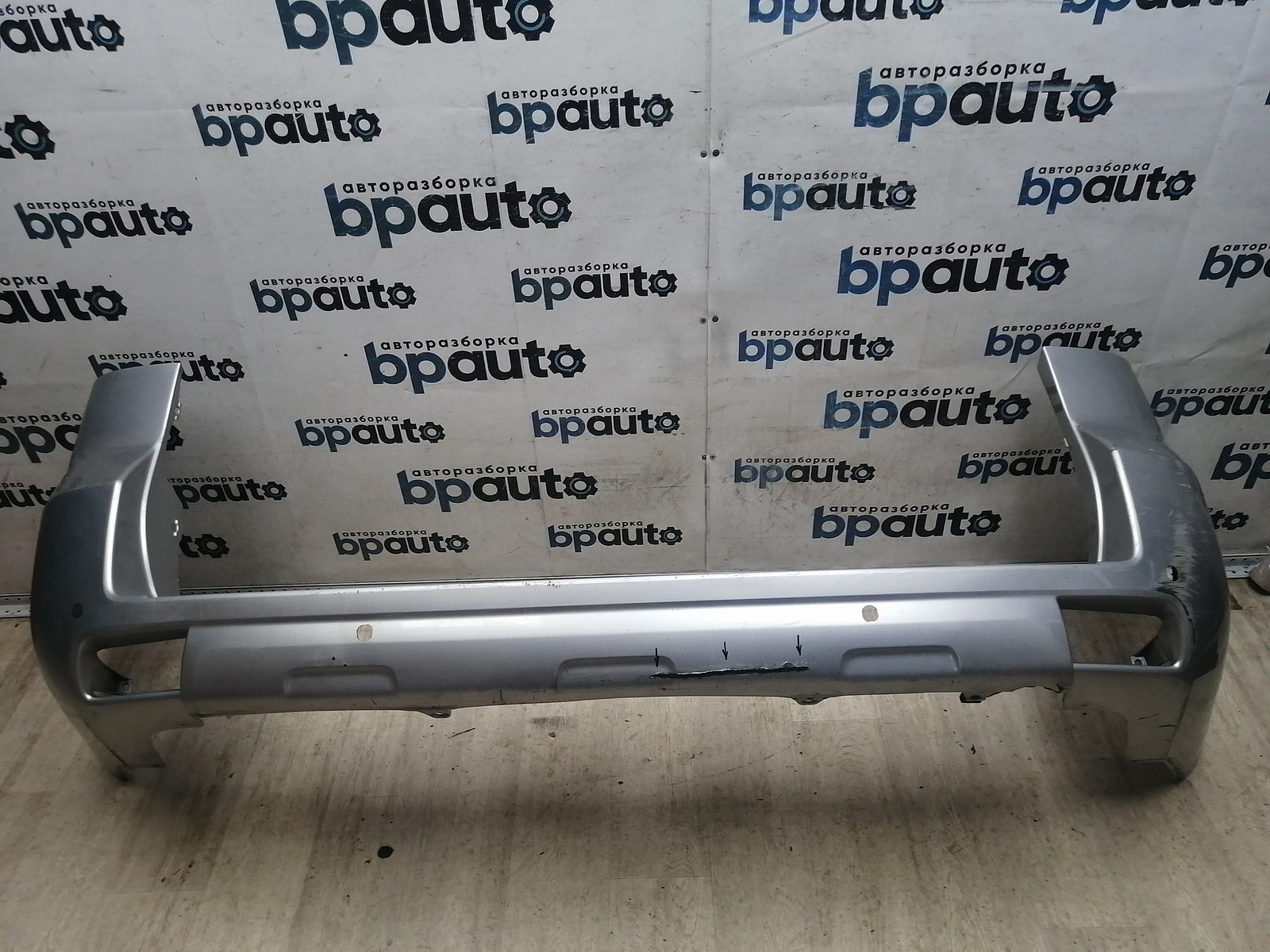 Пример детали Бампер задний; под паркт. (52159-60500); Toyota Land Cruiser Prado 150 (2010 — 2013), 150 рест. (2013 — 2017) /AA045786/ БУ; Оригинал; Р1, Мелкий дефект; 