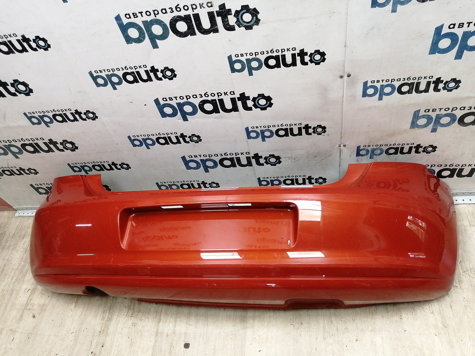 Пример детали Бампер задний; без паркт. (6R6807421BK); Volkswagen Polo V Hatchback (2009-2013) /AA044591/ БУ; Оригинал; Р1, Мелкий дефект; 