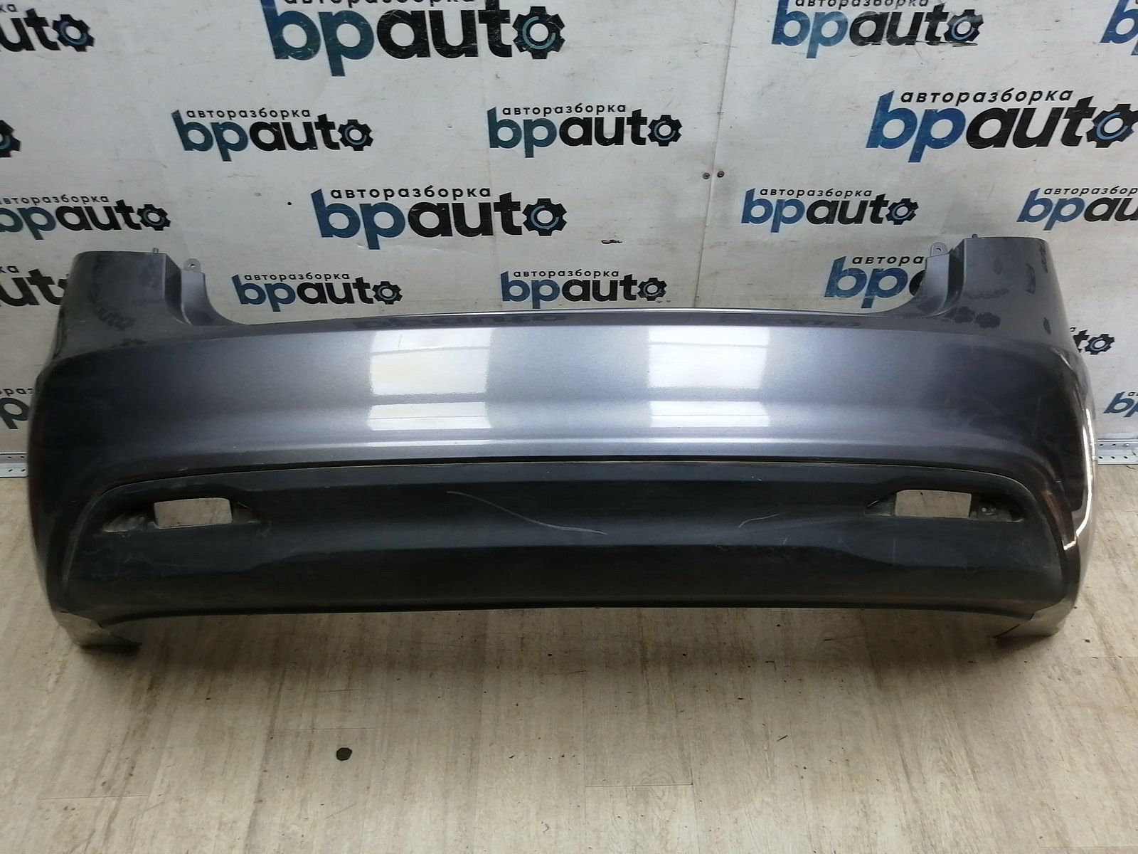 Пример детали Бампер задний; без паркт. (86611-4Y000); Kia Rio III Sedan (2011- 2015) /AA046110/ БУ; Оригинал; Р1, Мелкий дефект; ДхШхВ 1,85х0,73х0,57; 