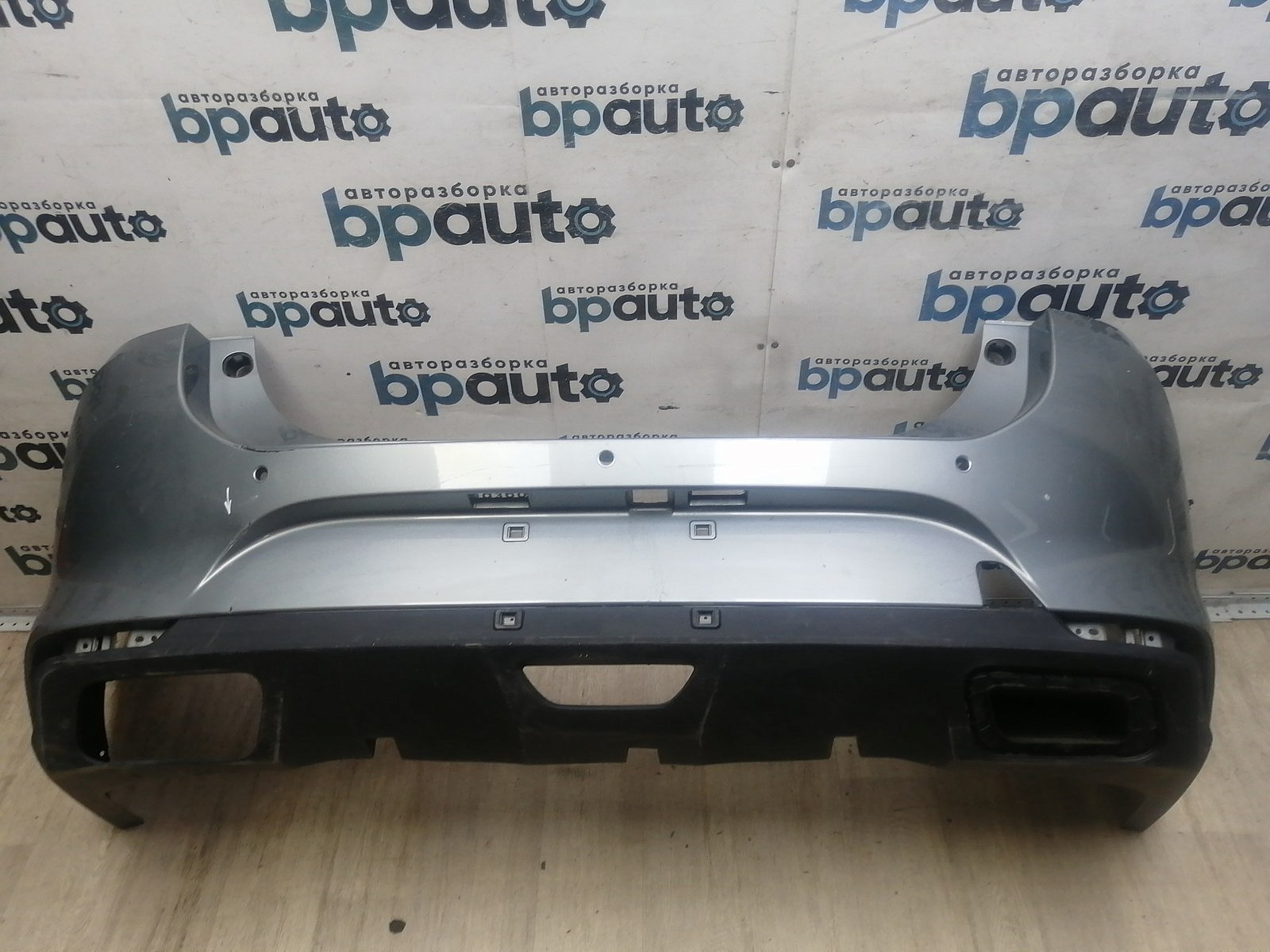 Фотография детали AA046203; Бампер задний; под паркт. (602001646AA) для Kaiyi E5 (2021-2026)/БУ; Оригинал; Р1, Мелкий дефект; . Фото номер 1