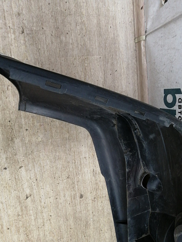 Фотография детали AA033289; Бампер задний; без паркт. (8200576893) для Renault Logan I (2004-2009)/БУ; Оригинал; Р1, Мелкий дефект; . Фото номер 18